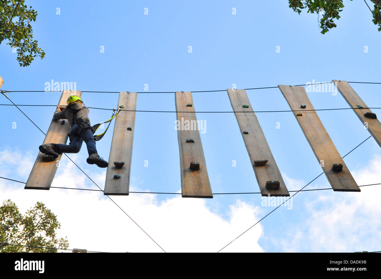 boy climbing in a climbing crag, Netherlands, Northern Netherlands