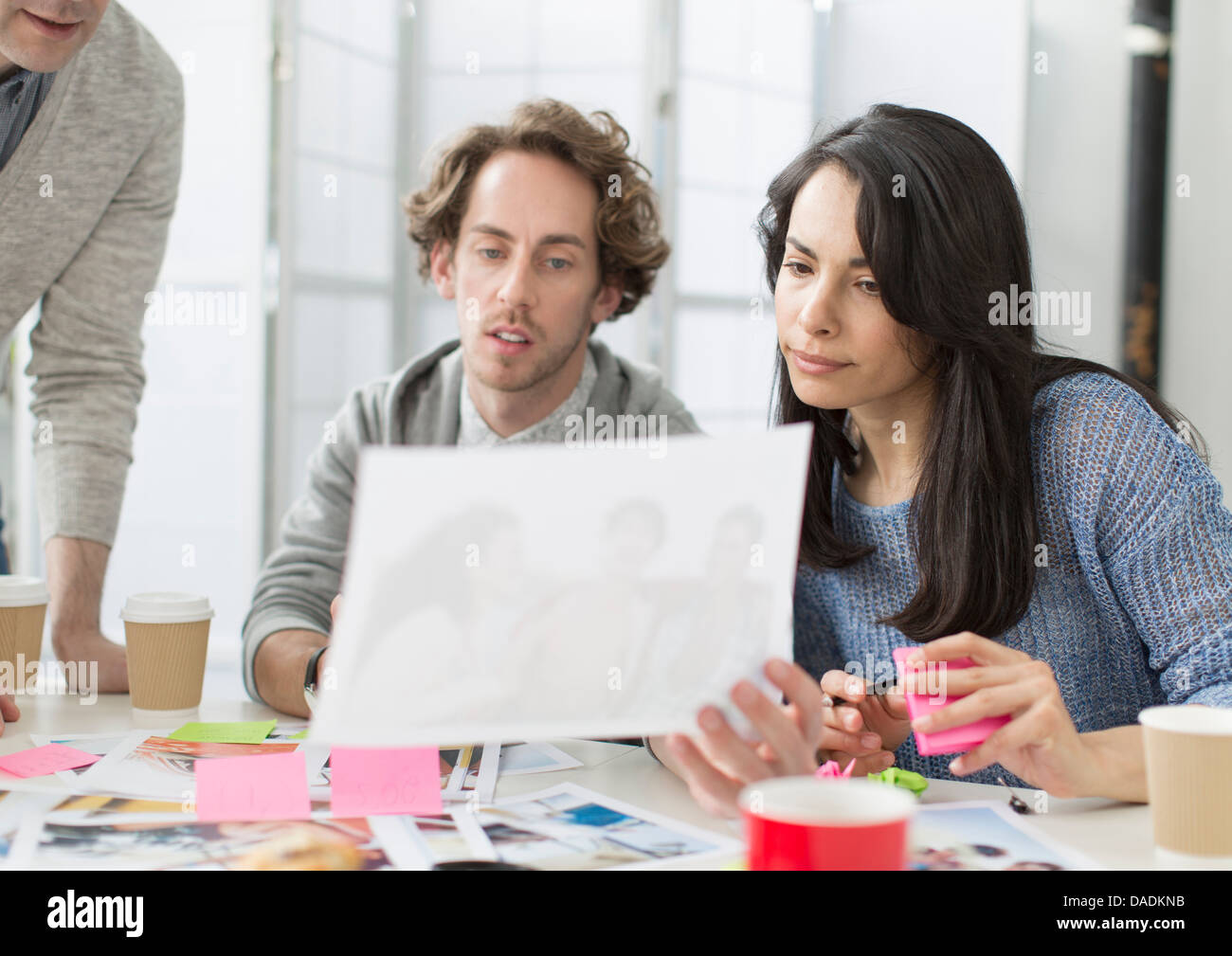 Creative team discussing plans in office meeting Stock Photo