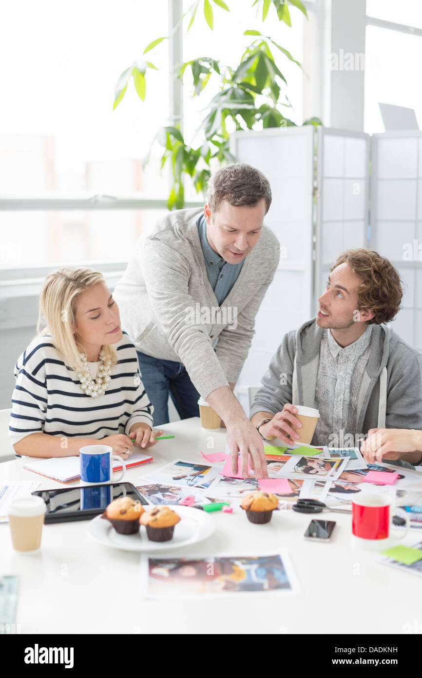 Creative team discussing plans in office meeting Stock Photo