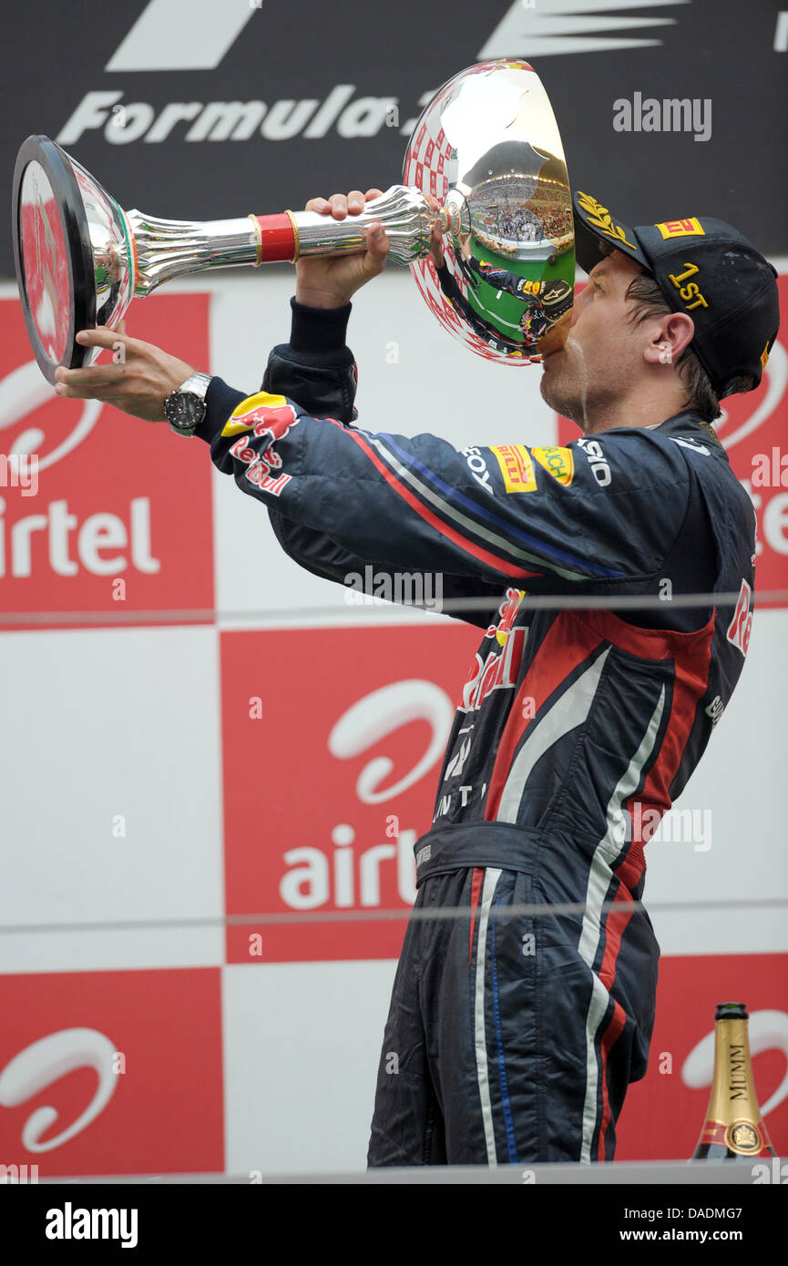 Vettel 2011 German Formula One driver Sebastian Vettel of Red Bull takes a swig of ...