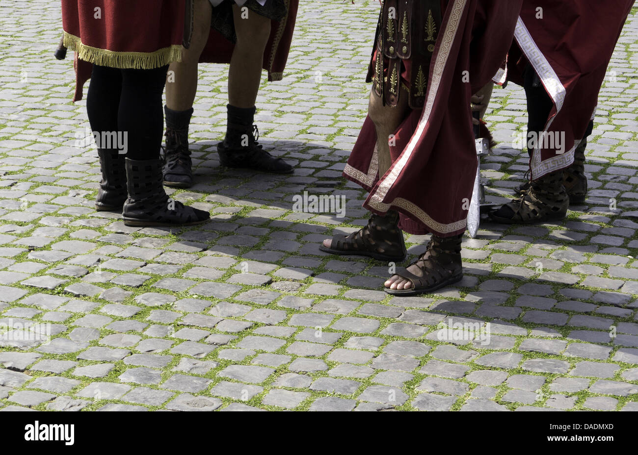 Men in historic Roman uniforms wait to guide tourist through Rome, Italy, 05 April 2011. Photo: Caroline Seidel Stock Photo