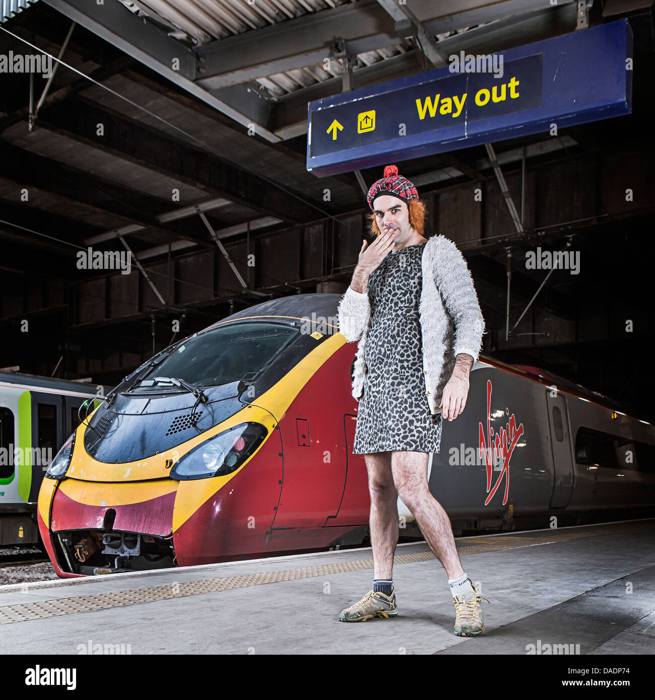 Comic actor Milo McCabe in character as his Scottish train spotter and Adele fan. Stock Photo