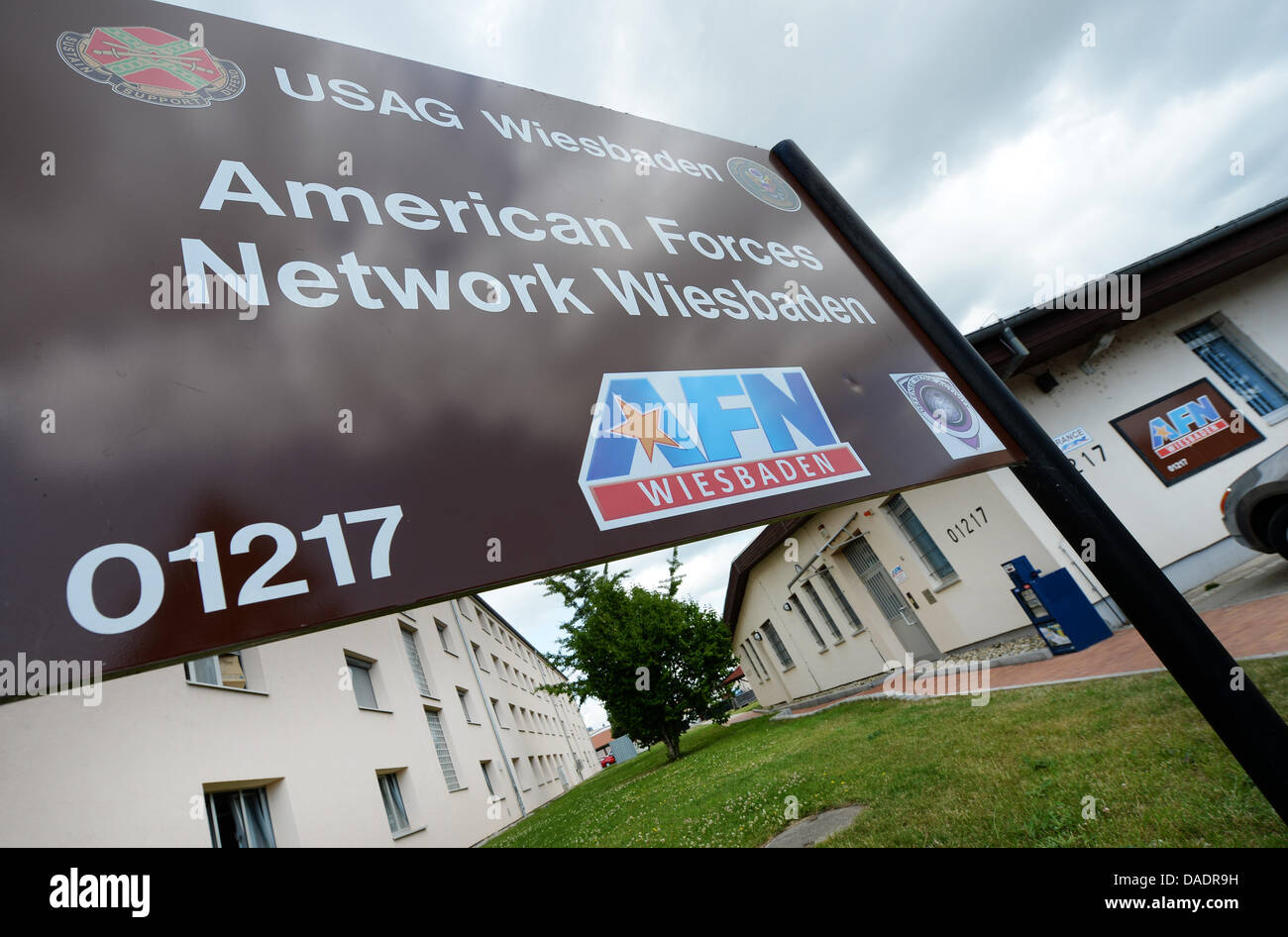 A sign points at the recording and boradcast studios of the US Armed Forces Network AFN in Wiesbaden-Erbenheim, Germany, 11 July 2013. AFN was founded and first went on air in July 1943 setting up local radion stations first in Europe and subesquently around the world where US troops were deployed. Photo: Arne Dedert Stock Photo