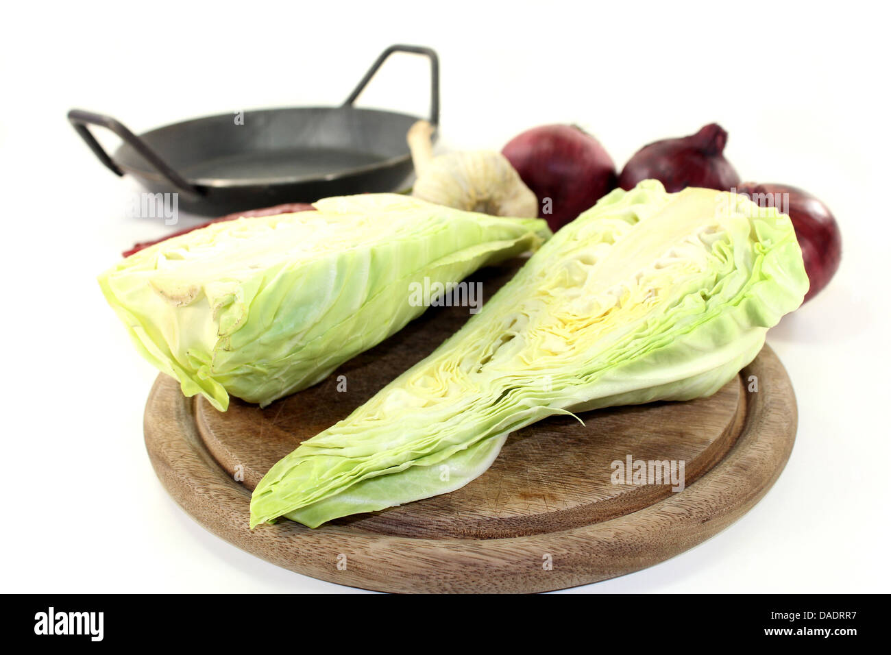 a sliced sweetheart cabbage on a wooden board Stock Photo