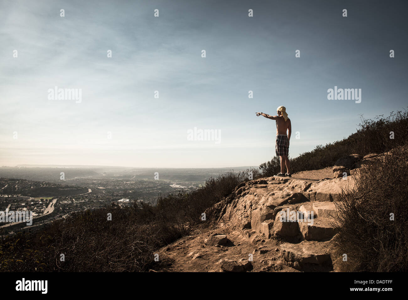Man pointing at view over San Diego, California, USA Stock Photo