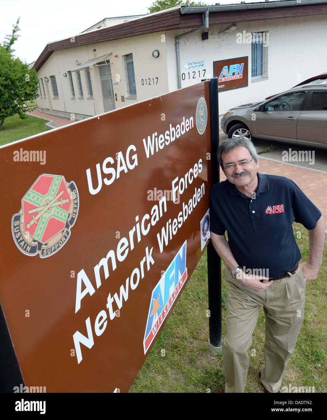 The head of the US Armed Forces Network AFN, Gary Bautell, stands outside the broadcasting studio  in Wiesbaden-Erbenheim, Germany, 11 July 2013. AFN was founded and first went on air in July 1943 setting up local radion stations first in Europe and subesquently around the world where US troops were deployed. Photo: Arne Dedert Stock Photo