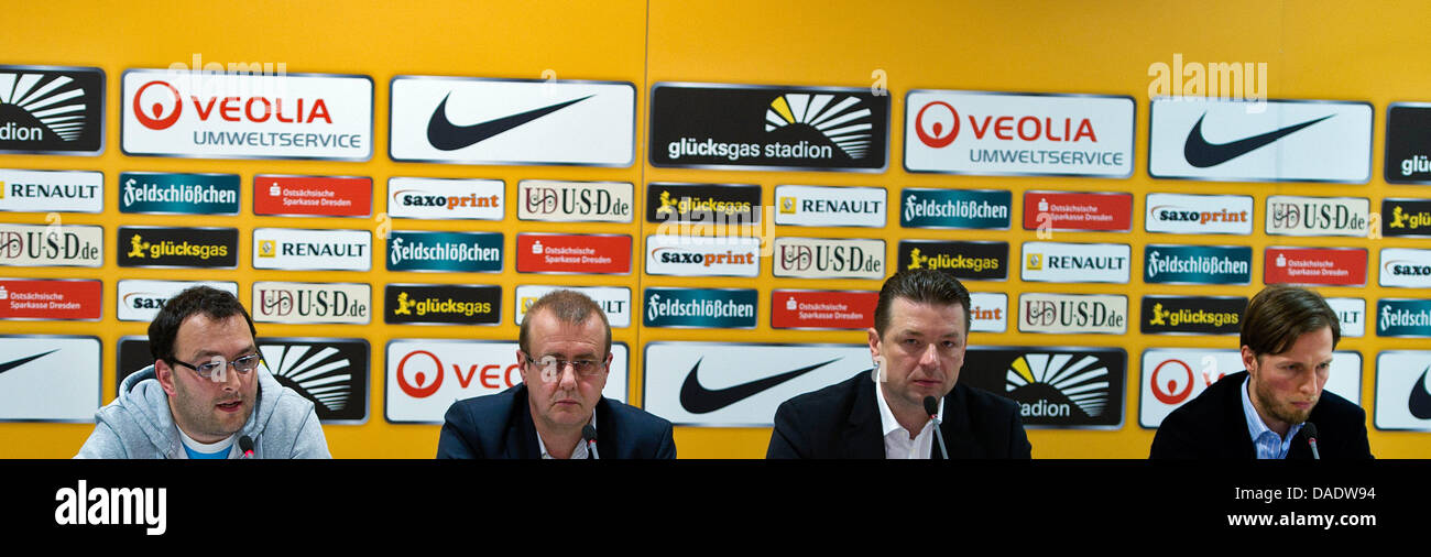 Martin Boerner (L-R), organization and events director for SG Dynamo Dresden, Andreas Ritter, club president, Volker Sholz, Press spokesman, and Volker Oppitz, managing director of SG Dynamo Dresden, take part in a press conference at Glueckgas Arena in Dresden, Germany, 02 November 2011. During the press conference, Oppitz as well as Boerner, organization and events director, comm Stock Photo