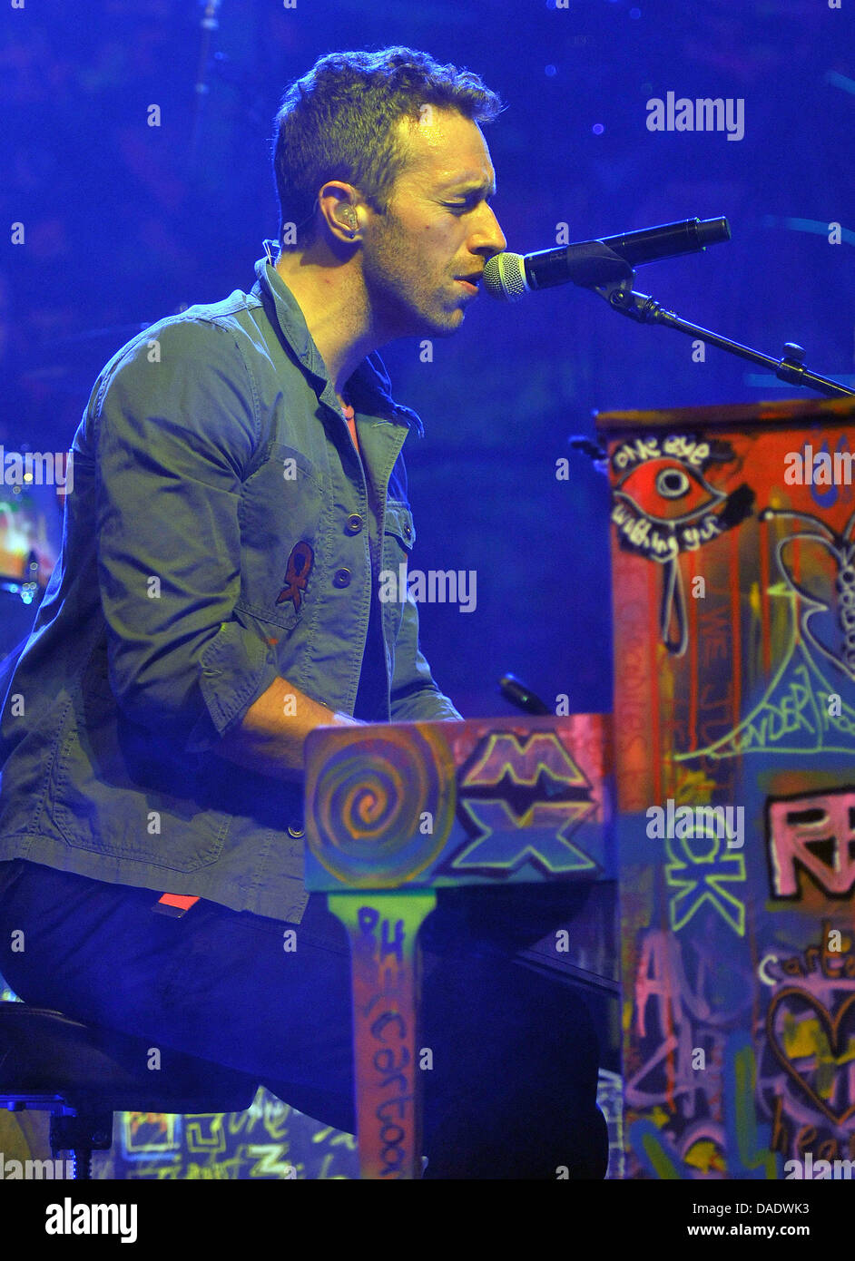 Singer Chris Martin of the band Coldplay plays piano during a concert at  the 'E-Werk' in Cologne, Germany, 02 November 2011. Tickets for the concert  were given to radio listeners and were