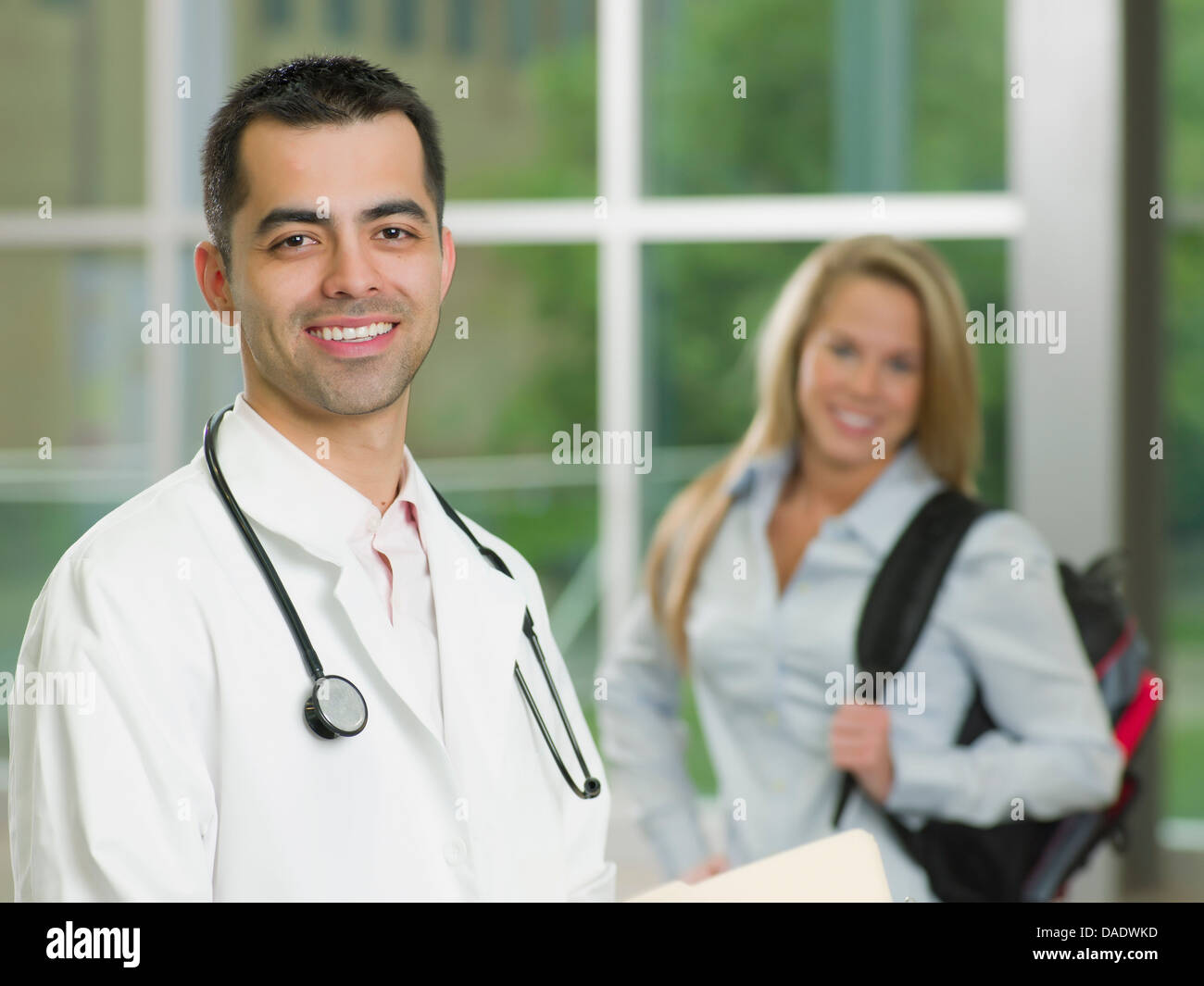 Mid adult male doctor hi-res stock photography and images - Alamy