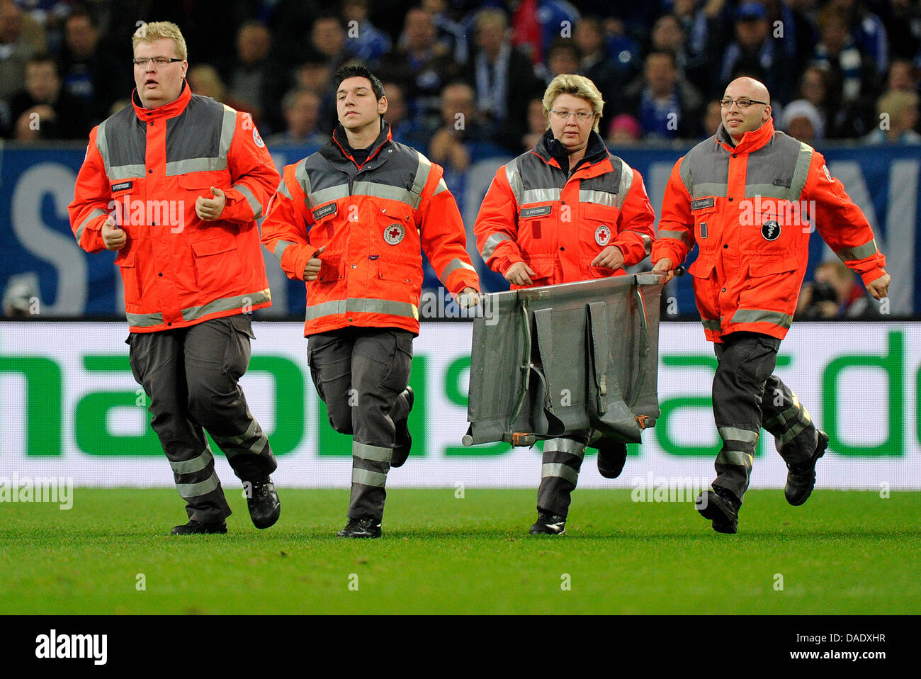 Paramedics run on the pitch during the Europa League group J match FC