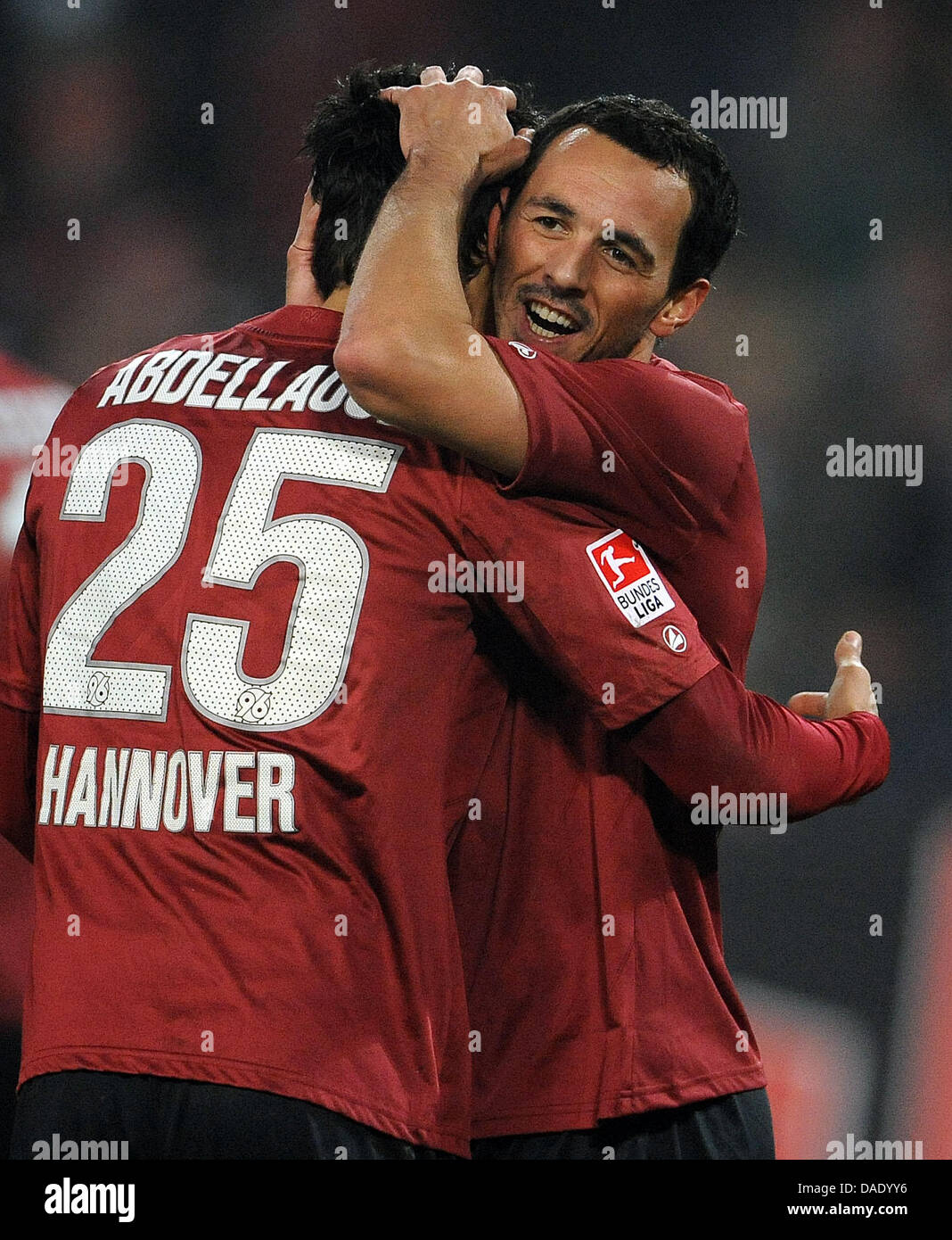 Hanover's Mohammed Abdellaoue (L) and Sergio Pinto celebrate the 2:1 during the Bundesliga soccer match Hanover 96 vs FC Schalke 04 at AWD-Arena in Hanover, Germany, 06 November 2011. Photo: Peter Steffen    (ATTENTION: EMBARGO CONDITIONS! The DFL permits the further utilisation of the pictures in IPTV, mobile services and other new technologies only no earlier than two hours after Stock Photo