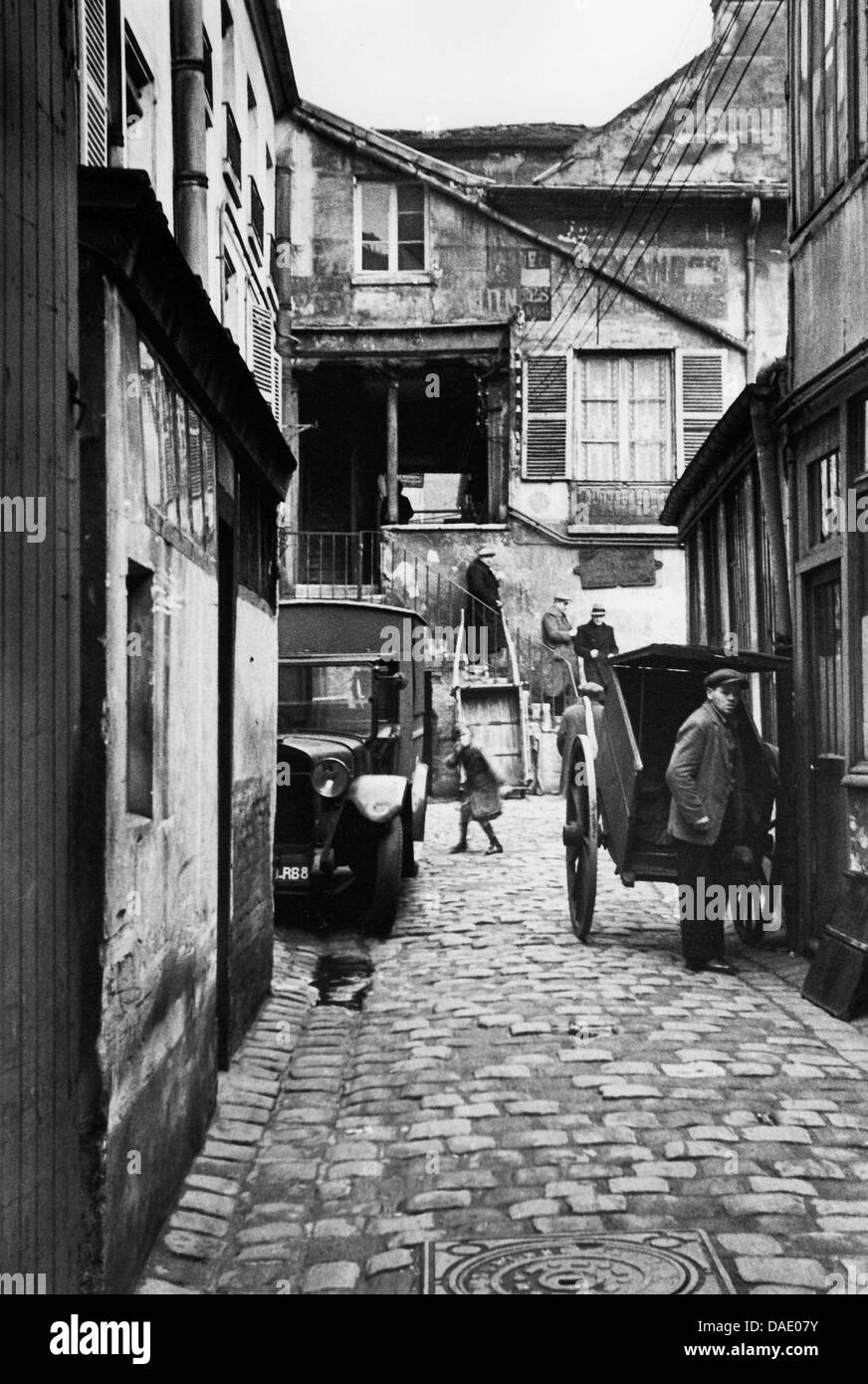 Paris 1935, alley. Image by photographer Fred Stein (1909-1967) who emigrated 1933 from Nazi Germany to France and finally to the USA. Stock Photo