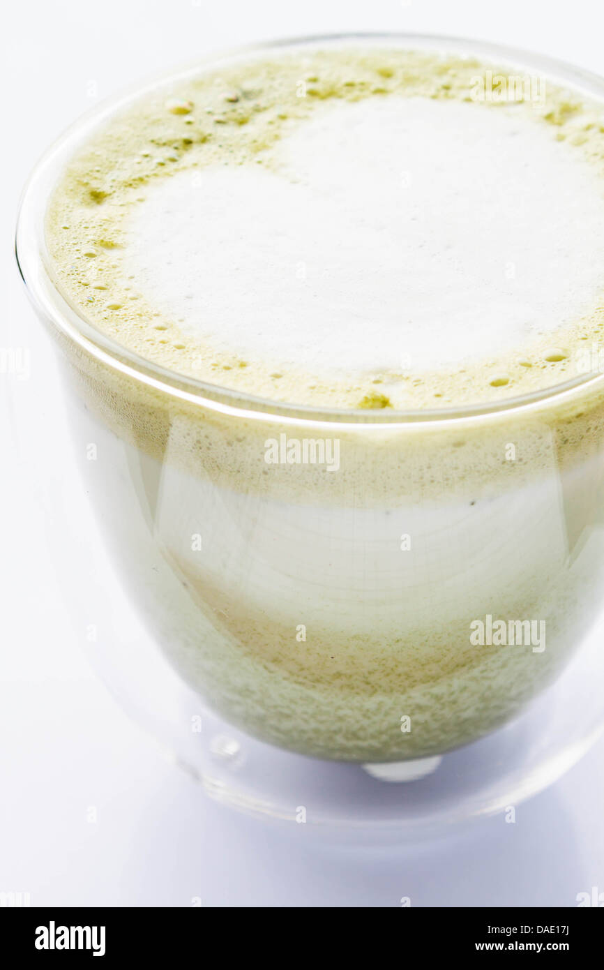 Matcha green tea latte glass isolated on white background Stock Photo