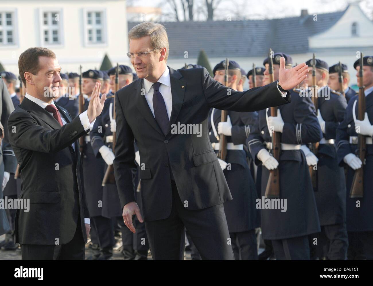 The Russian President Dmitry Medvedev (M) is welcomed with military ...