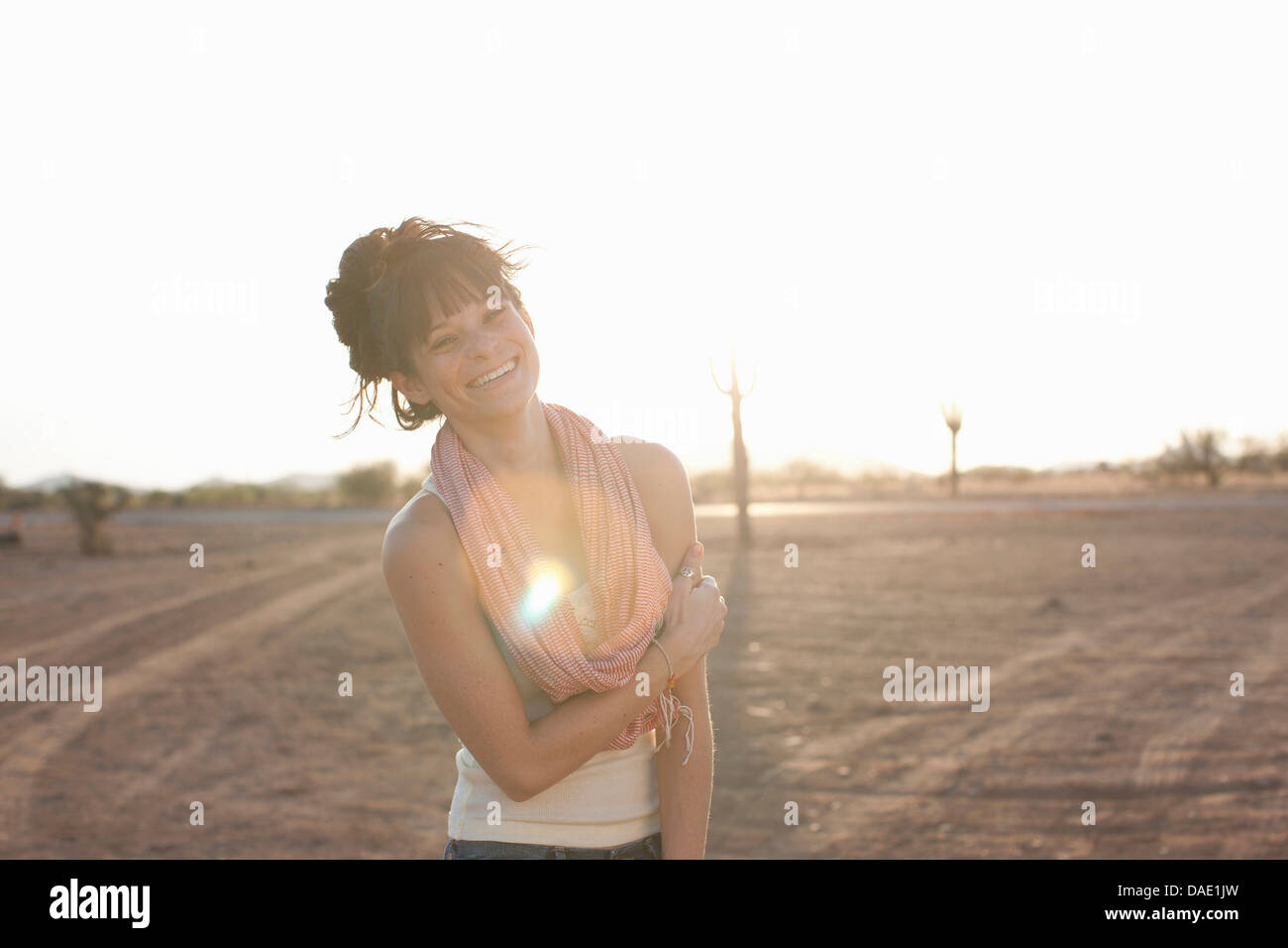 Young woman standing in desert hi-res stock photography and images - Alamy