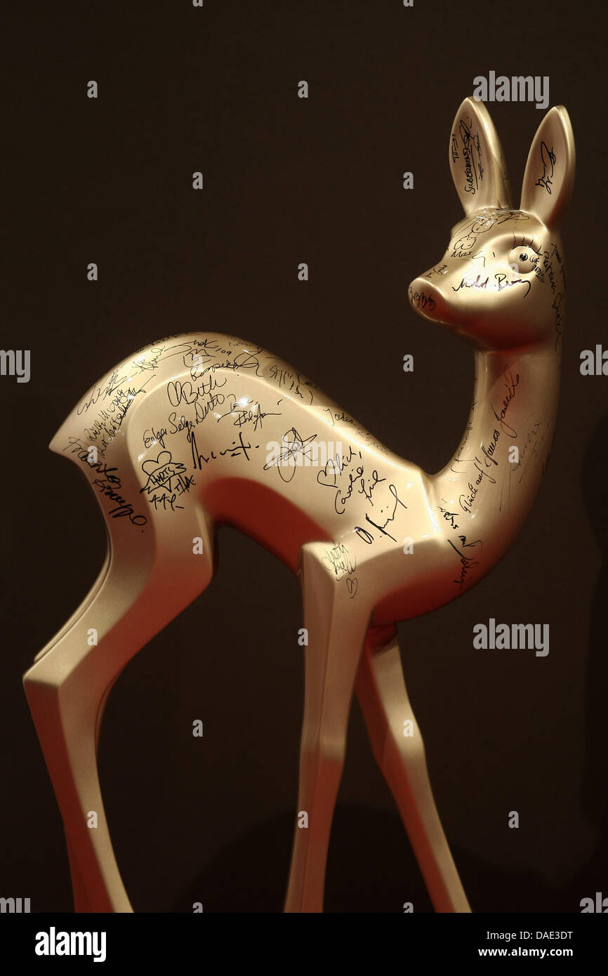 A Bambi sculpture with signatures of the awardees seen in the press