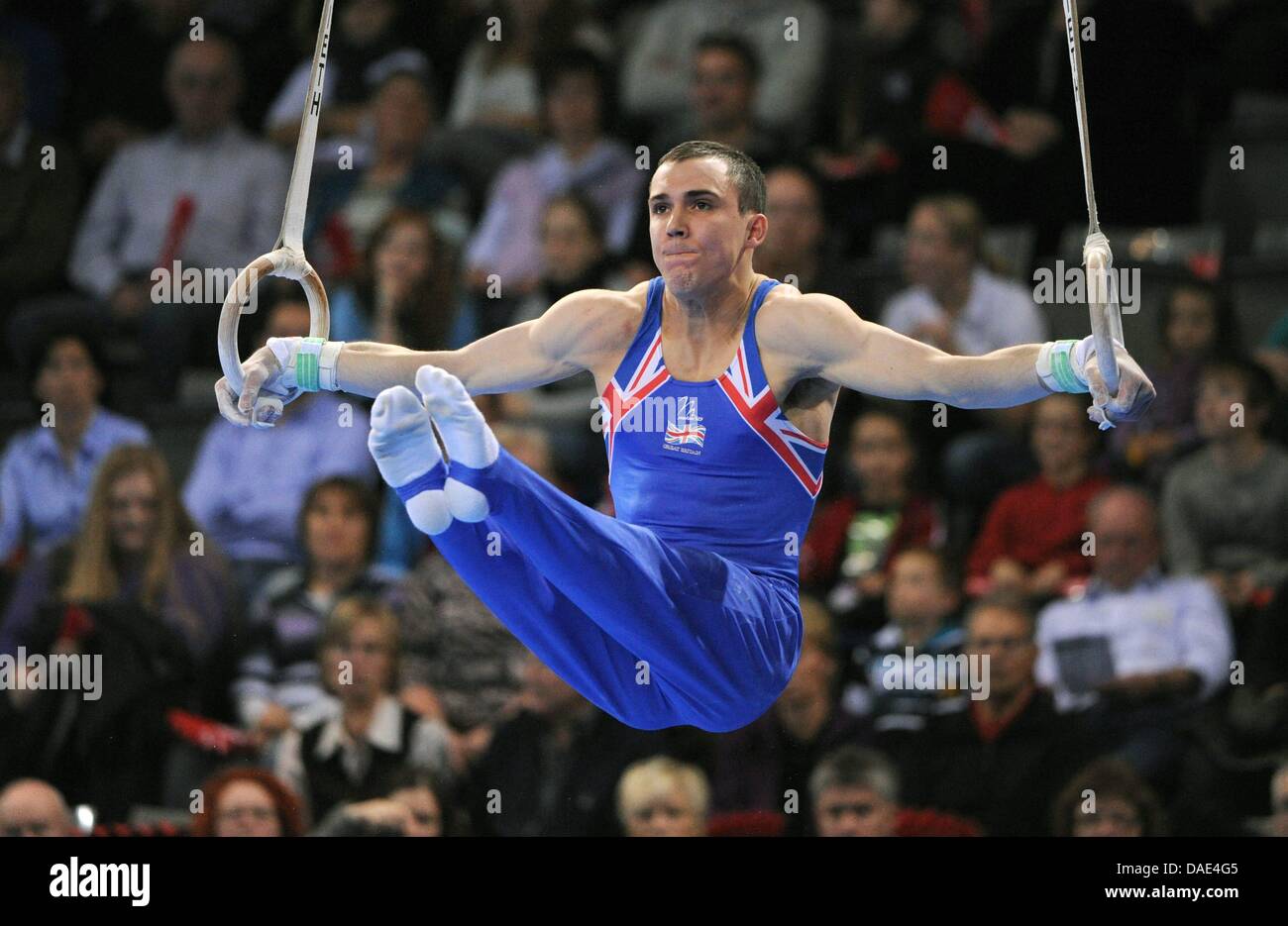 British athlete Samuel Hunter performs on the rings during the ...