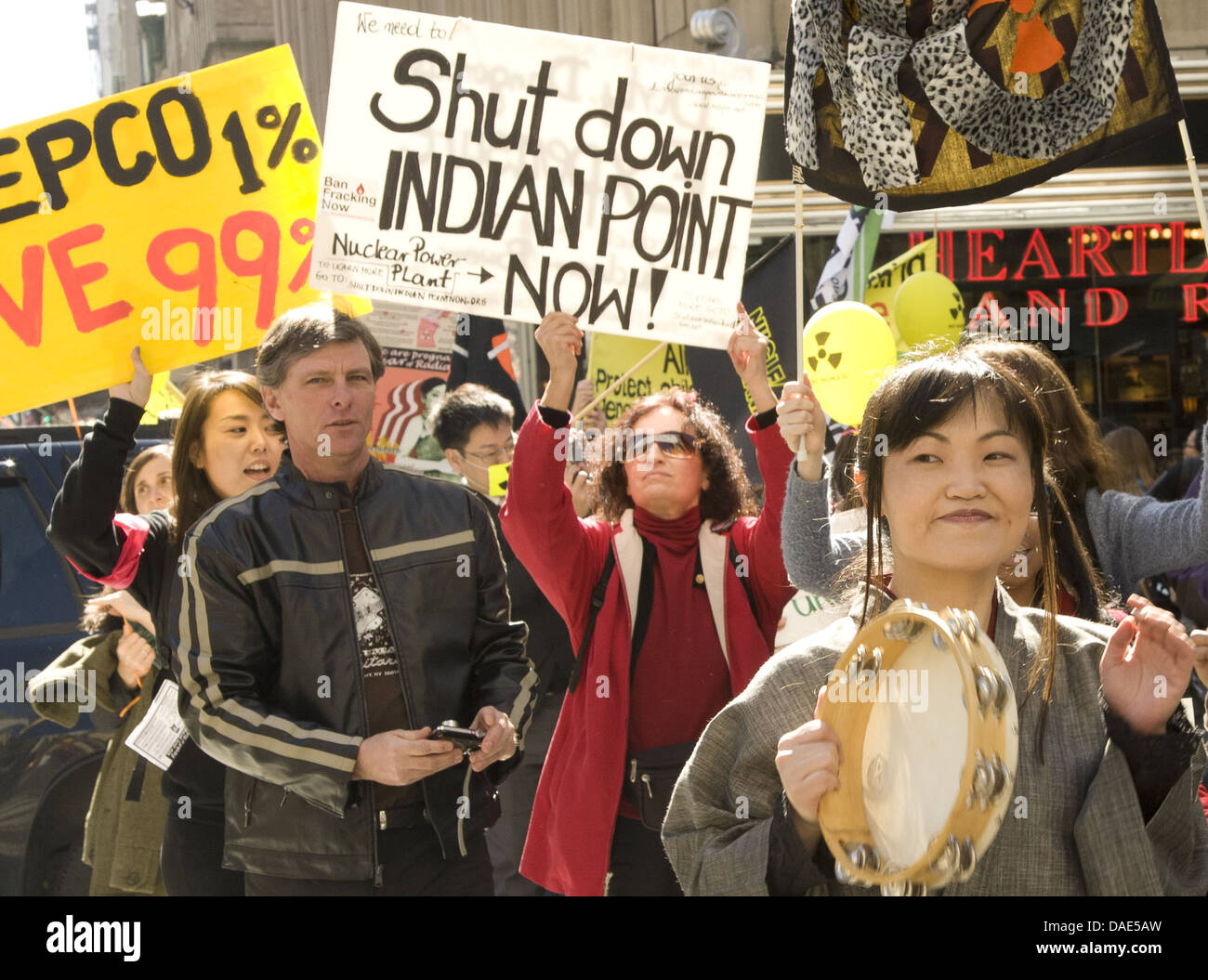 AntiNuclear rally & march in New York City commemorating the 1 year anniversary of the natural and nuclear disaster in Japan. Stock Photo