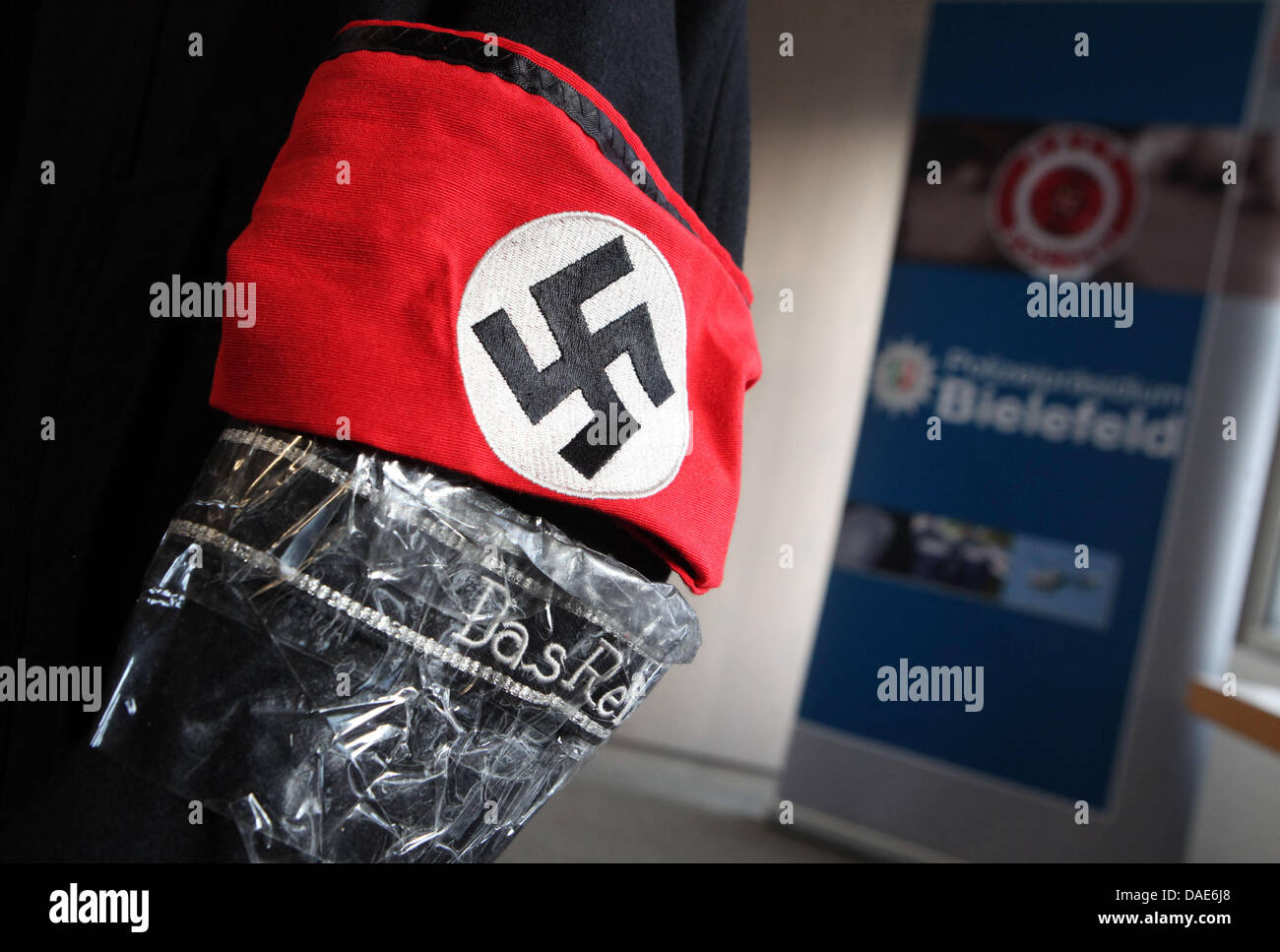 The jacket of the perpetrator with an armband and swastika symbol are  presented at a press conference in police headquarters in Bielefeld,  Germany, 15 November 2011. The police are reporting about the