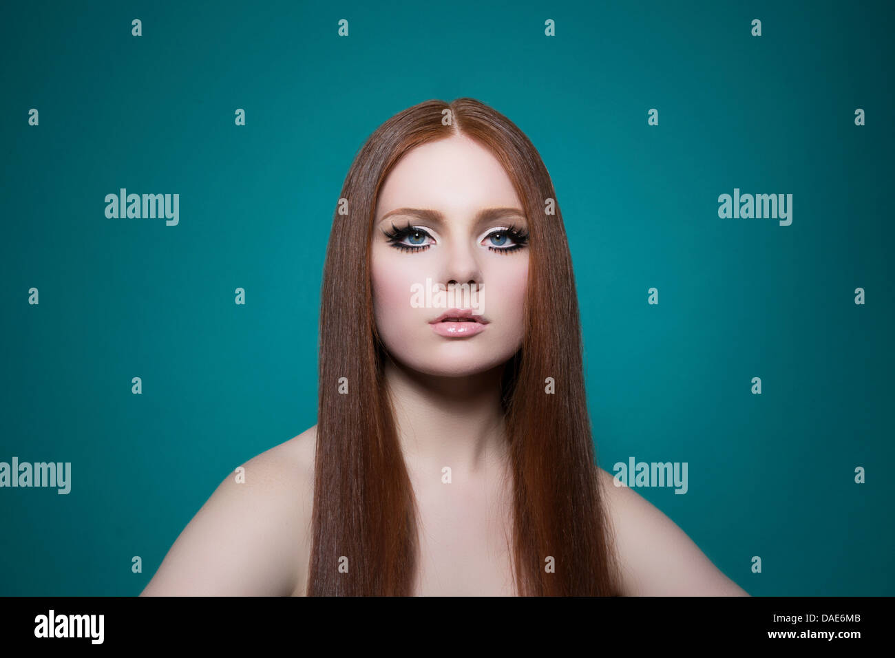 Portrait of woman with long red hair Stock Photo - Alamy