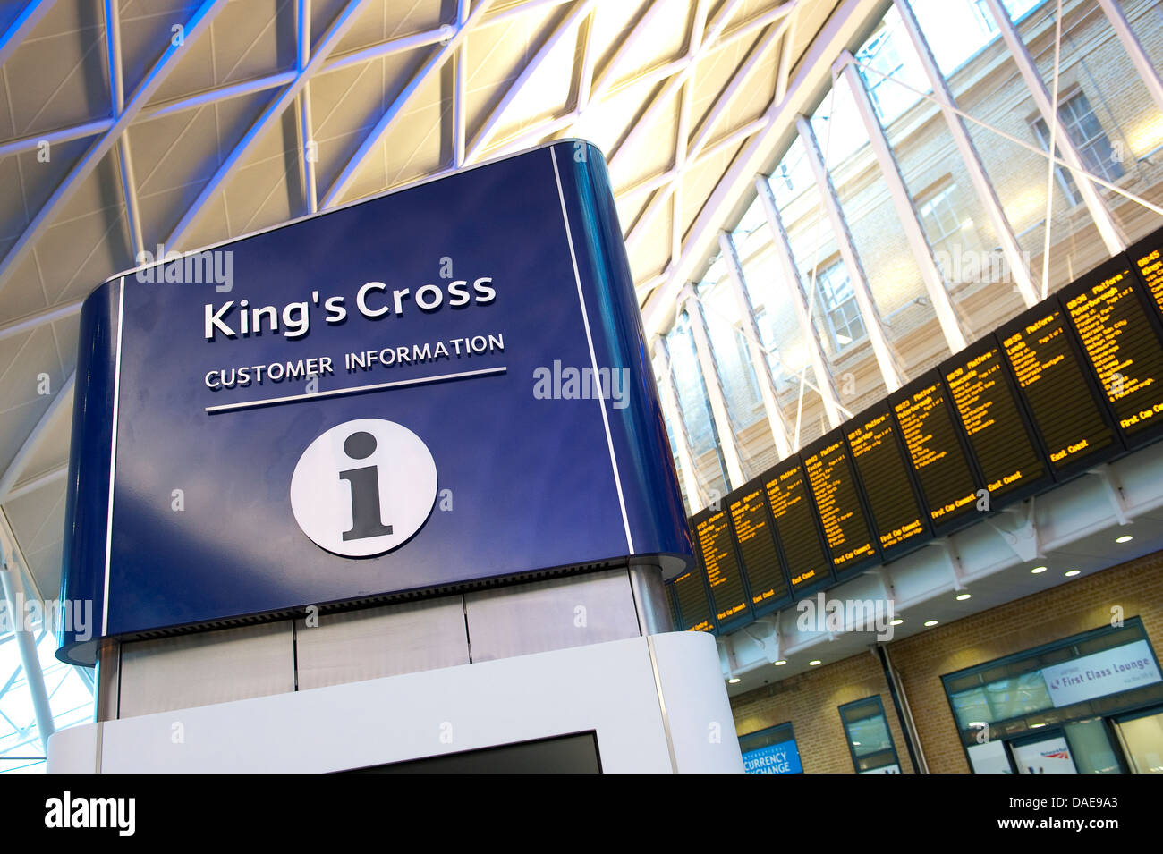 Passenger information point and departure board at Kings Cross Railway Station, London, England. Stock Photo