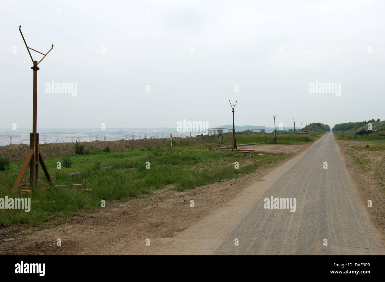 Irrigation system to cut down dust on a road close to a surface mine in