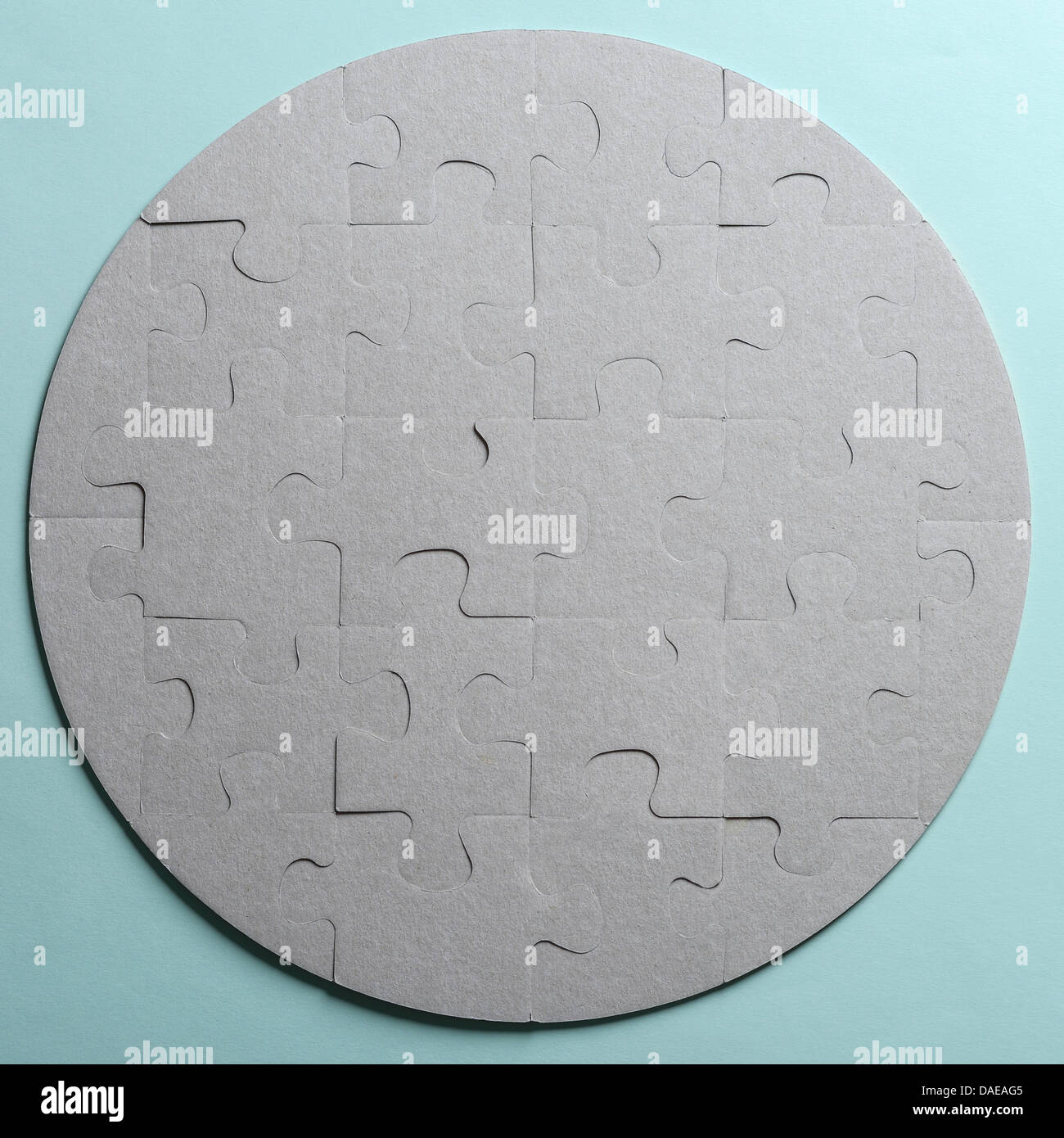 Circular cardboard jigsaw Stock Photo