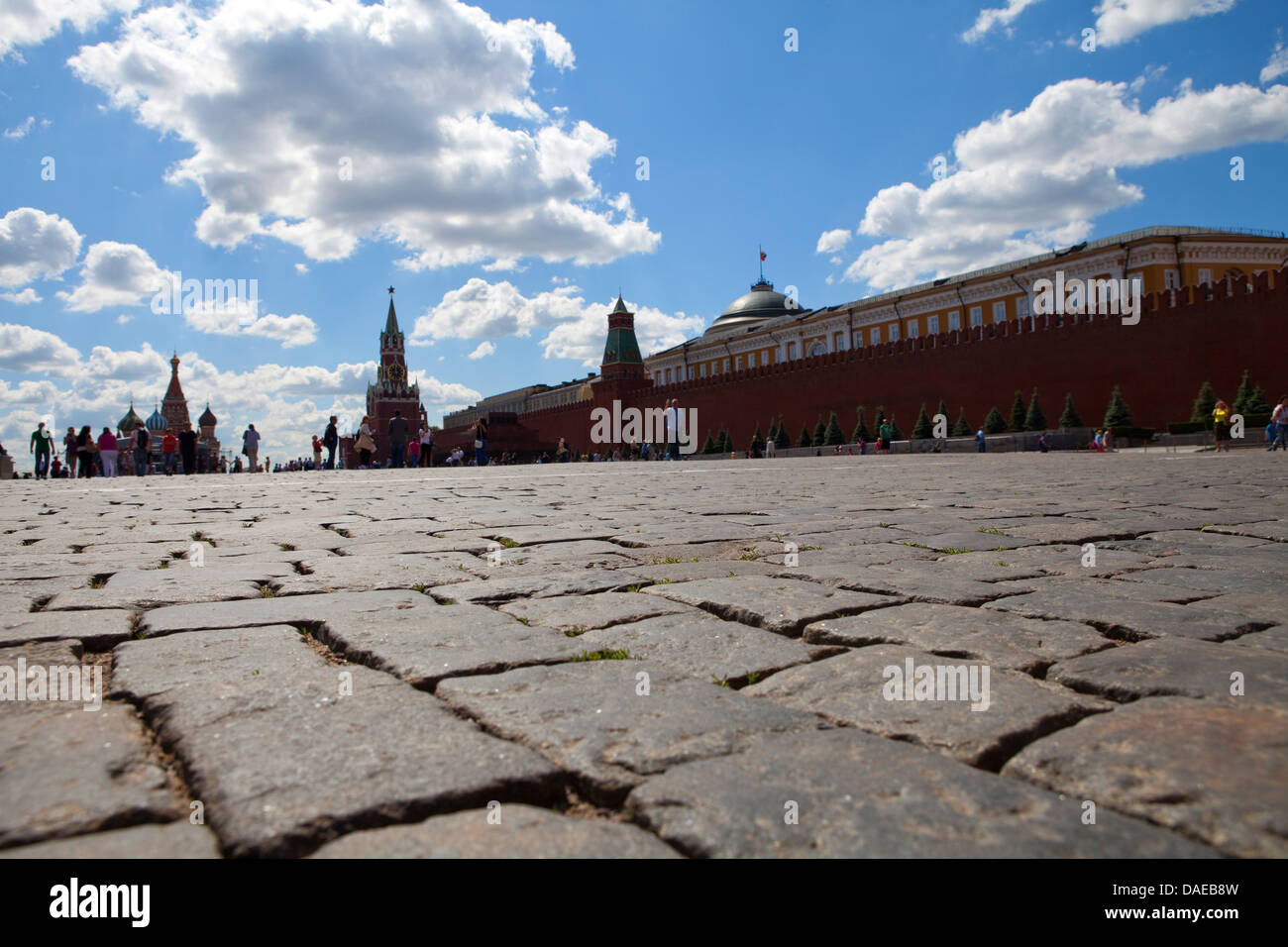 Moscow Kremlin silhouette in a sunny summer day; paving stone blocks Stock Photo