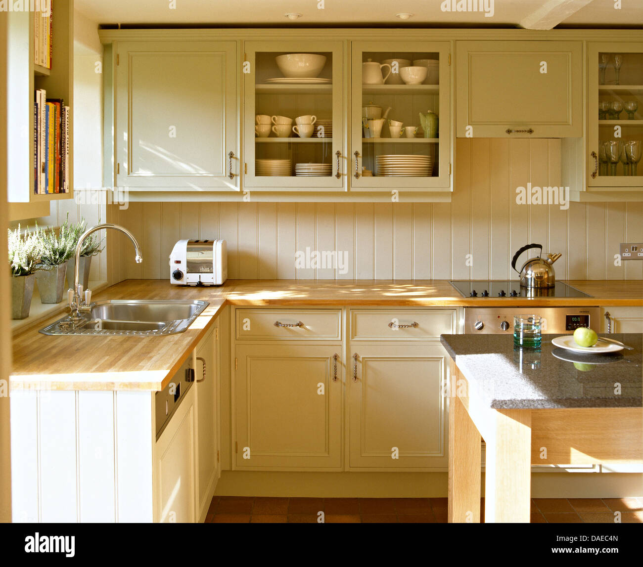 Beech Worktops On Cream Painted Units And Wall Cupboard In Shaker