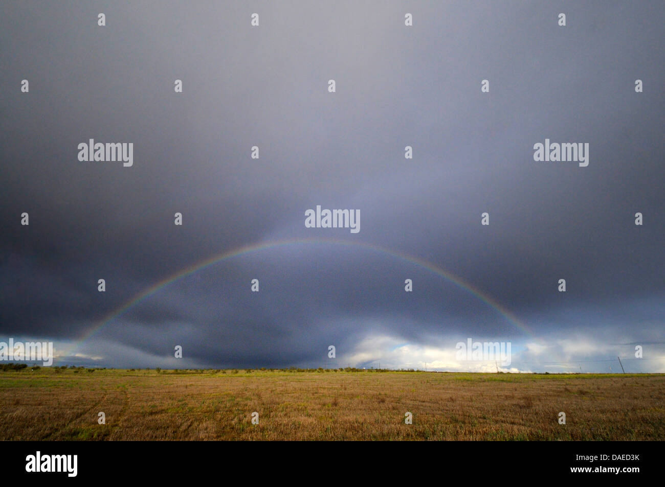 Rainbow dark clouds over spain hi-res stock photography and images - Alamy