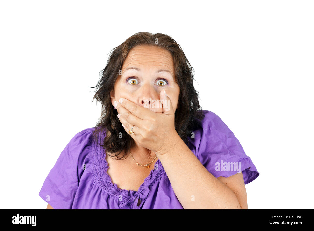Gobsmacked, shocked or surprised woman with hand over mouth Stock Photo