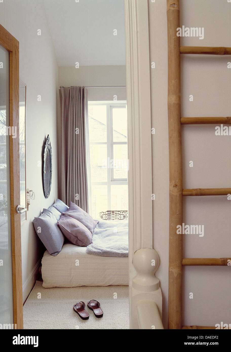 Wooden ladder beside open glass modern door to bedroom with wooden ladder beside open glass modern door to bedroom with mauve DAEDF2