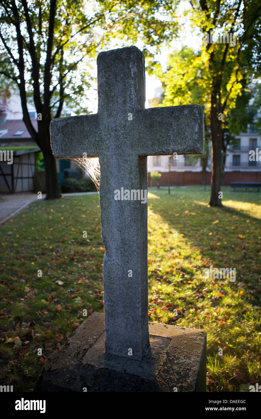 a stone cross in a church yard Stock Photo - Alamy