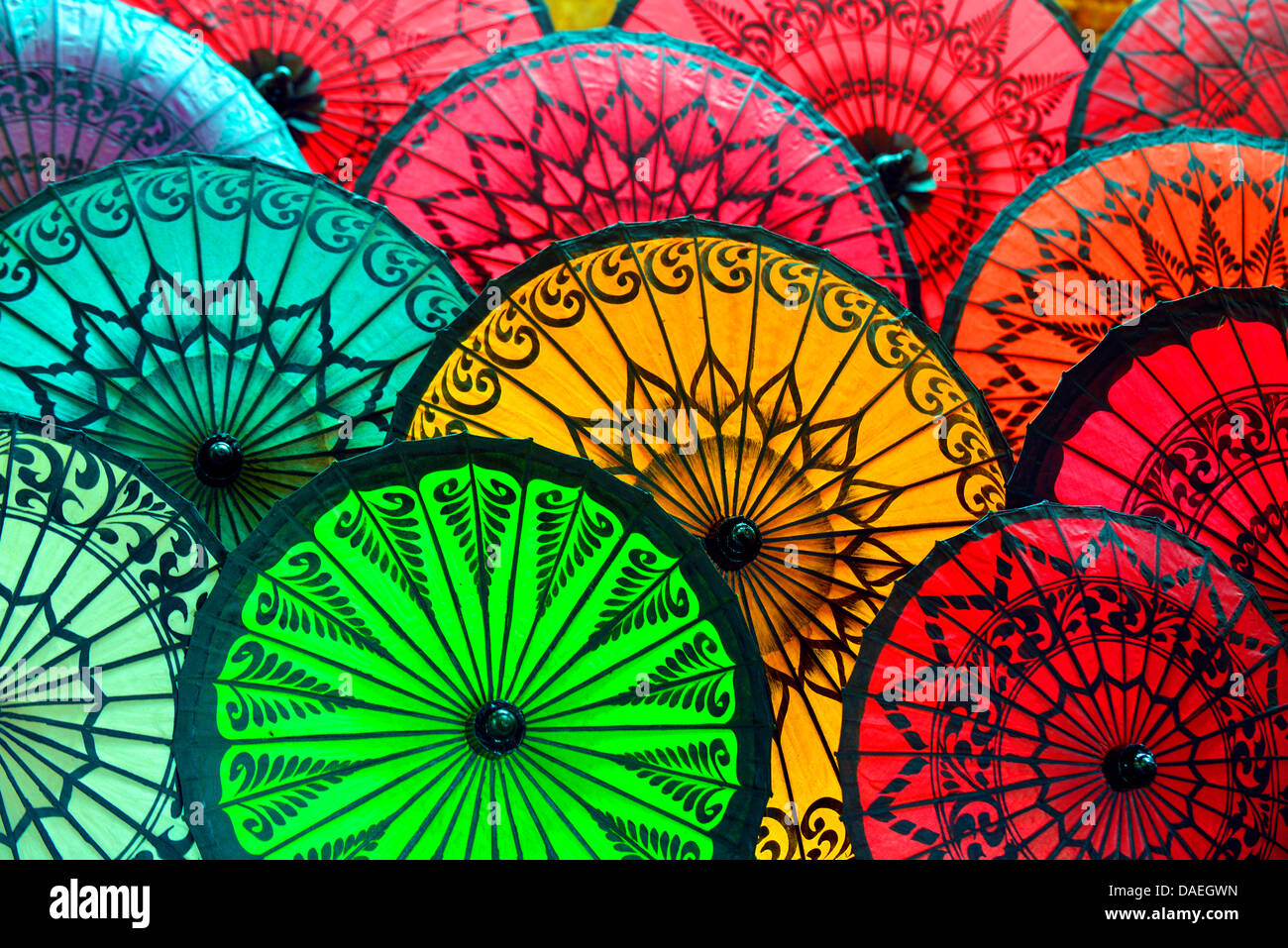 opened colourful parasols for sale, Burma, Yangon Stock Photo