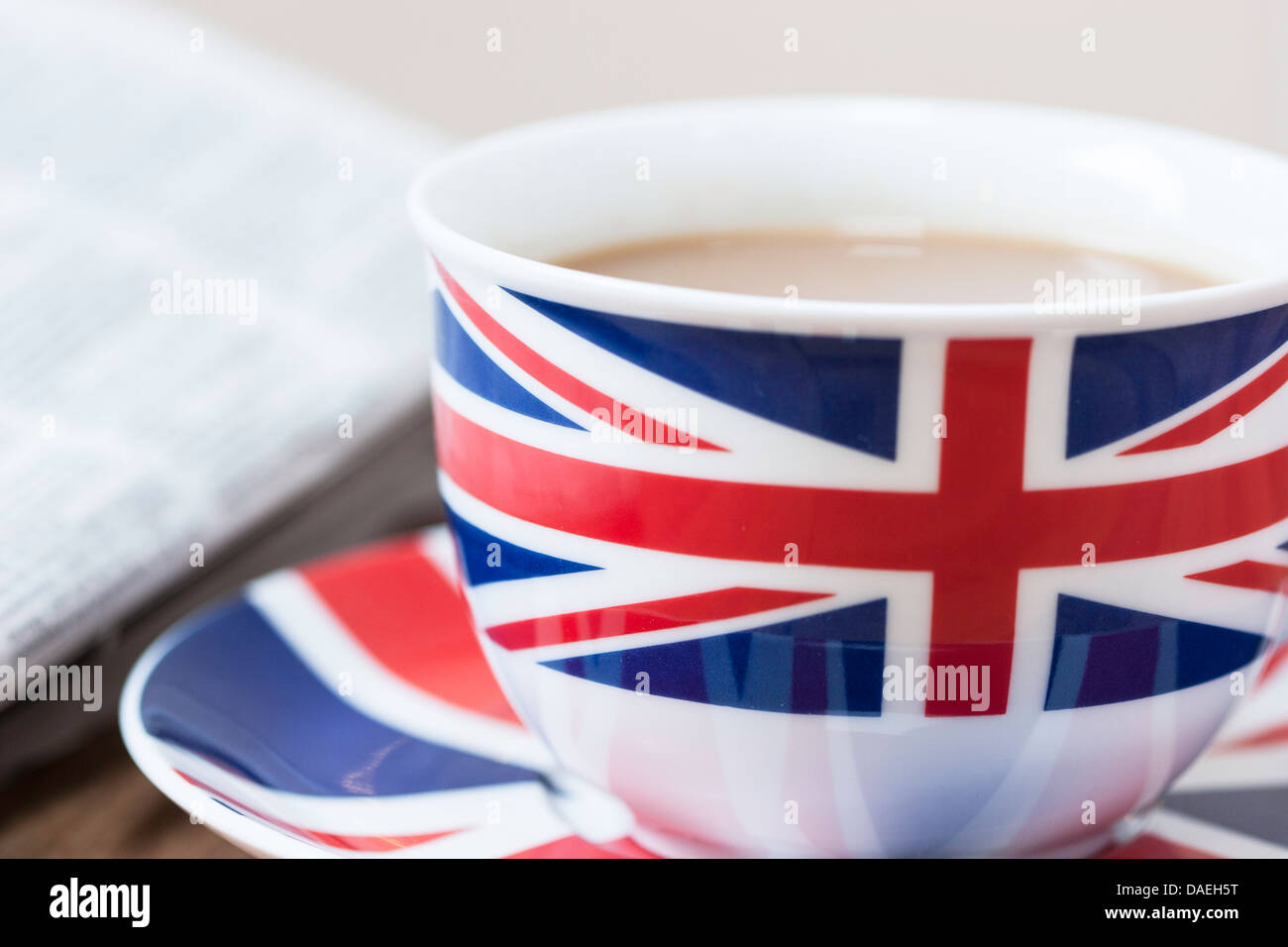 Cup of tea with Union Jack cup, saucer and newspaper, England, UK Stock  Photo - Alamy