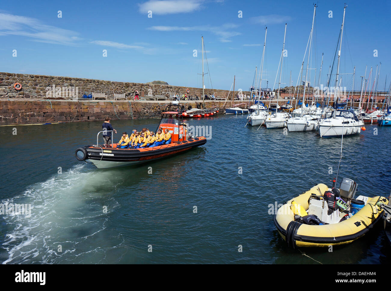 Seabird Seafari rigid inflatable boat departing harbour in North
