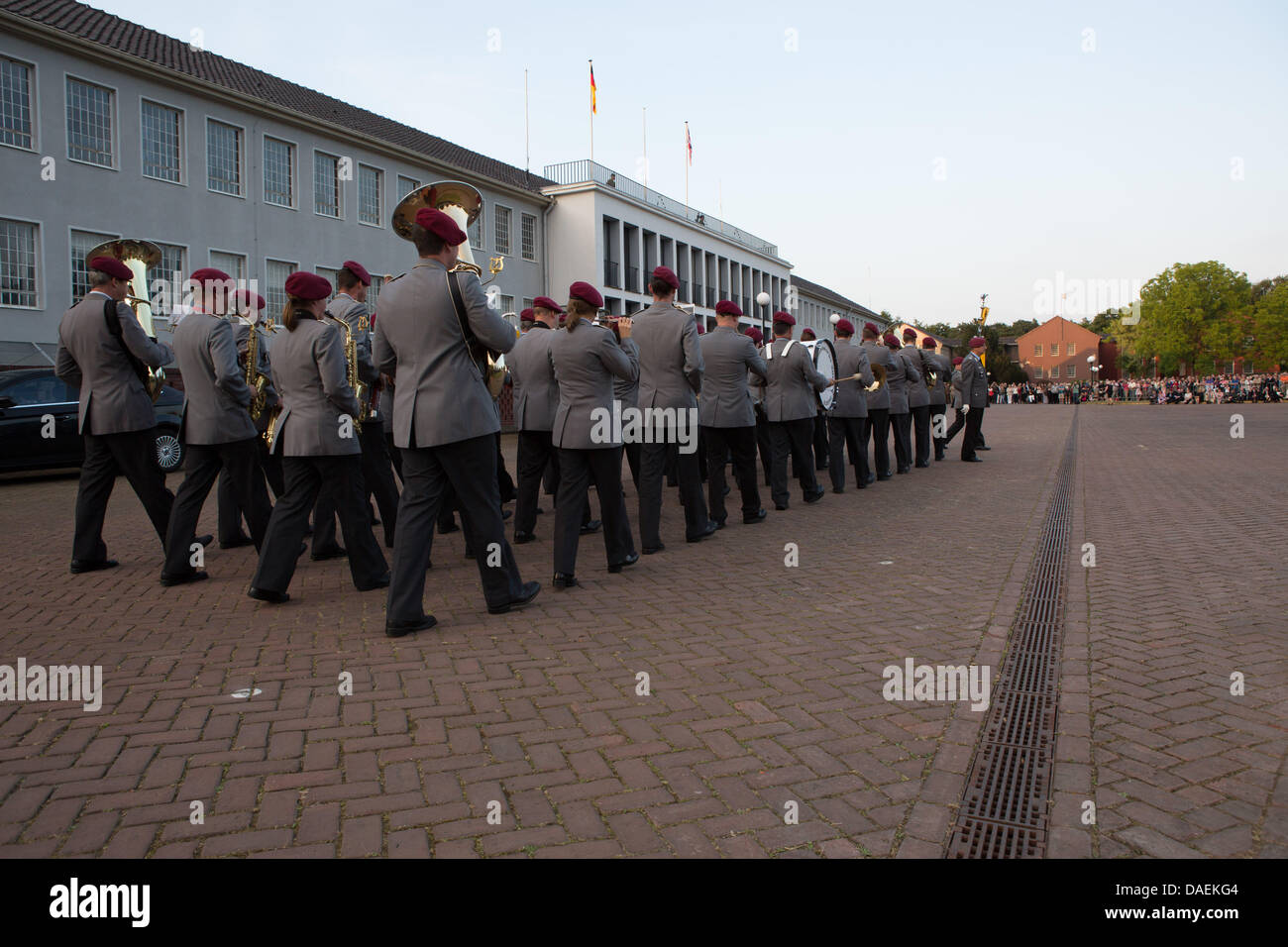 The German Army's Heeresmusikkorps 300 band from Koblenz performs in a Beating Retreat ceremony in front of The Big House, Rheindahlen Military Complex, Germany Stock Photo