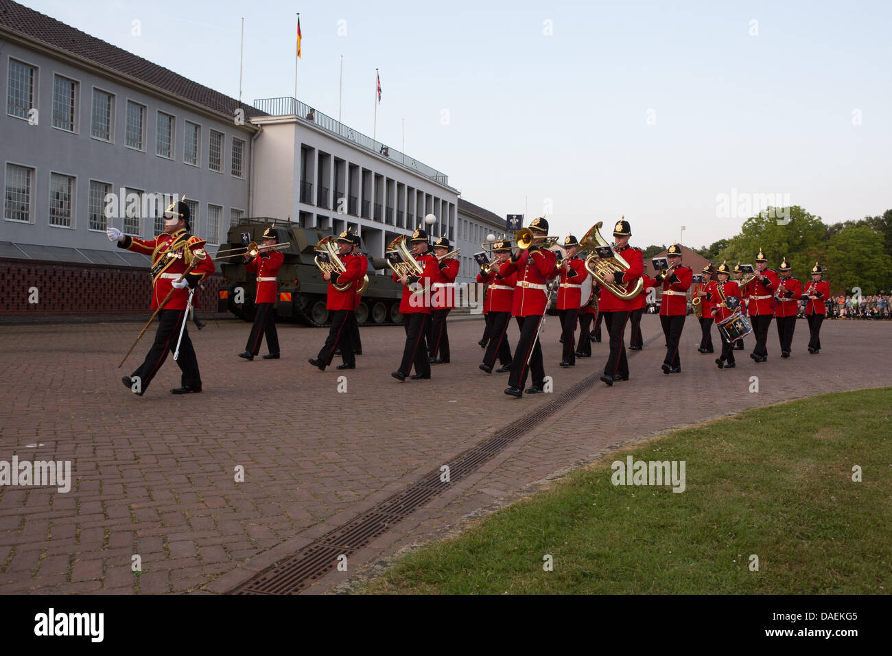 The Band of the Prince of Wales's Division performs in a Beating Retreat ceremony in front of The Big House, Rheindahlen Military Complex, Germany Stock Photo