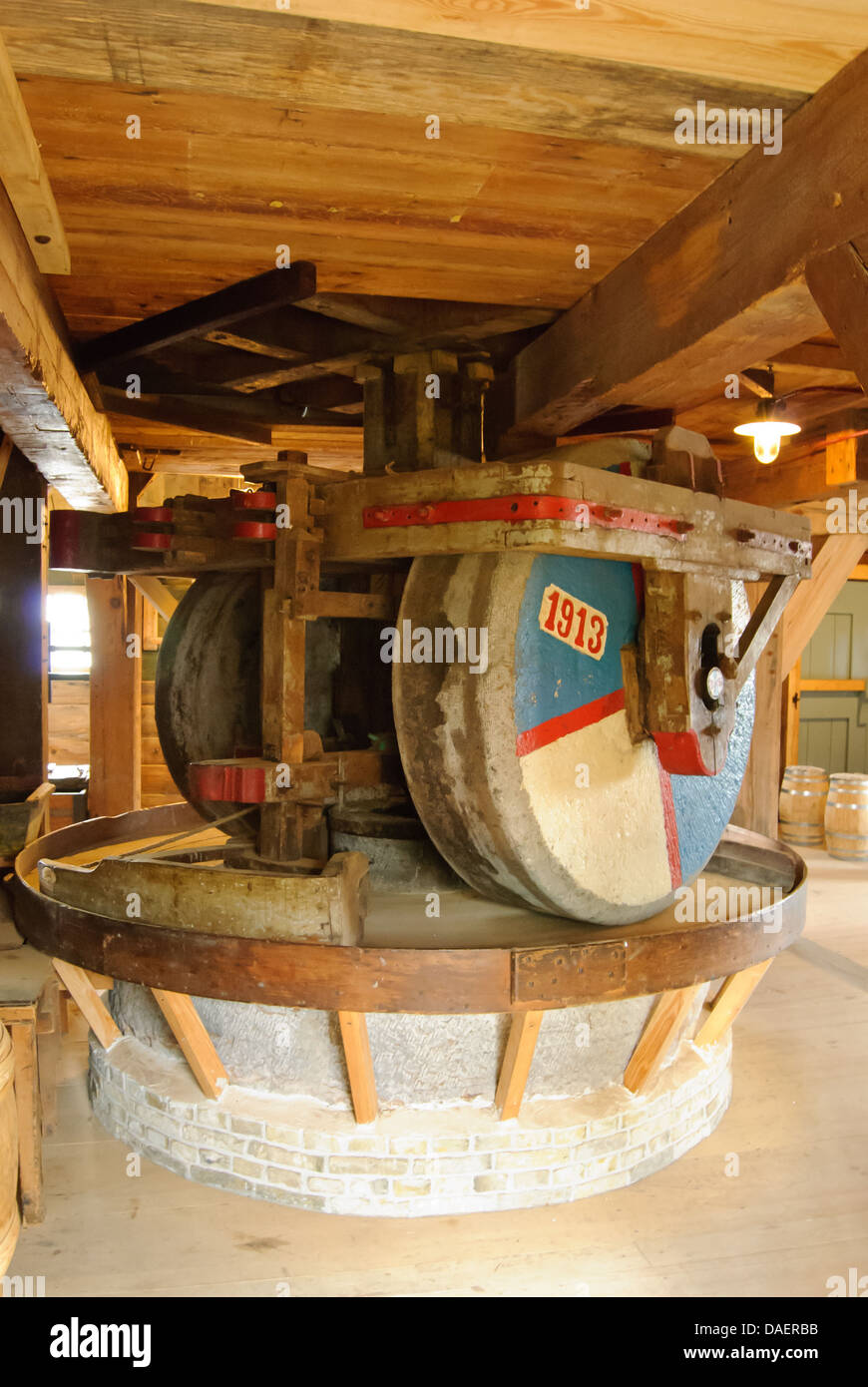 Old grinding machine worked by a windmill Stock Photo