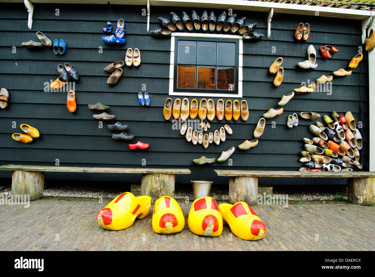 A shop wall full of Dutch wooden shoes Stock Photo