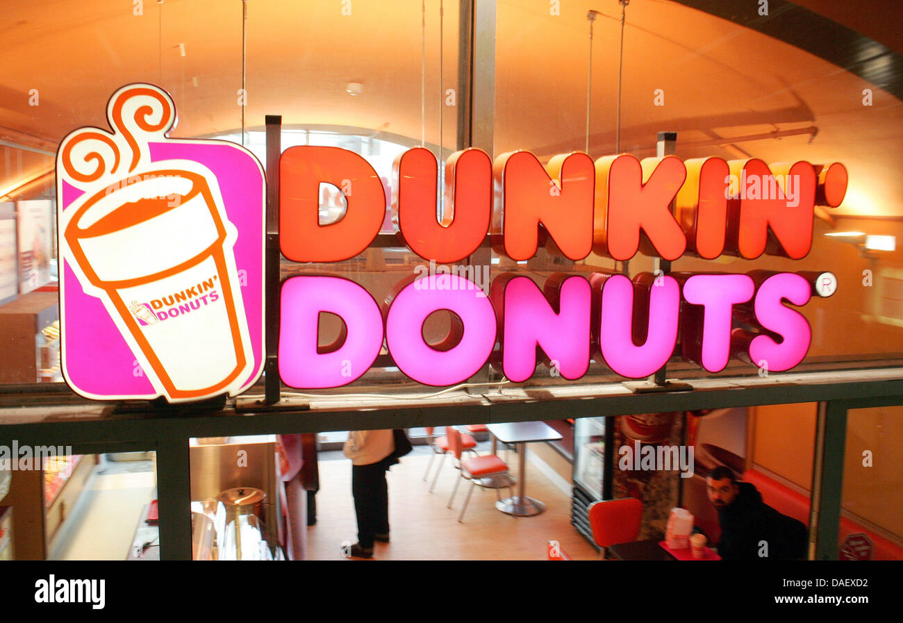 FILE - An archive picture dated 08 November 2007 shows the logo of the  American doughnut and coffee retailer Dunkin' Donuts at a branch in Berlin,  Germany. Manager Tony Pavese siad on