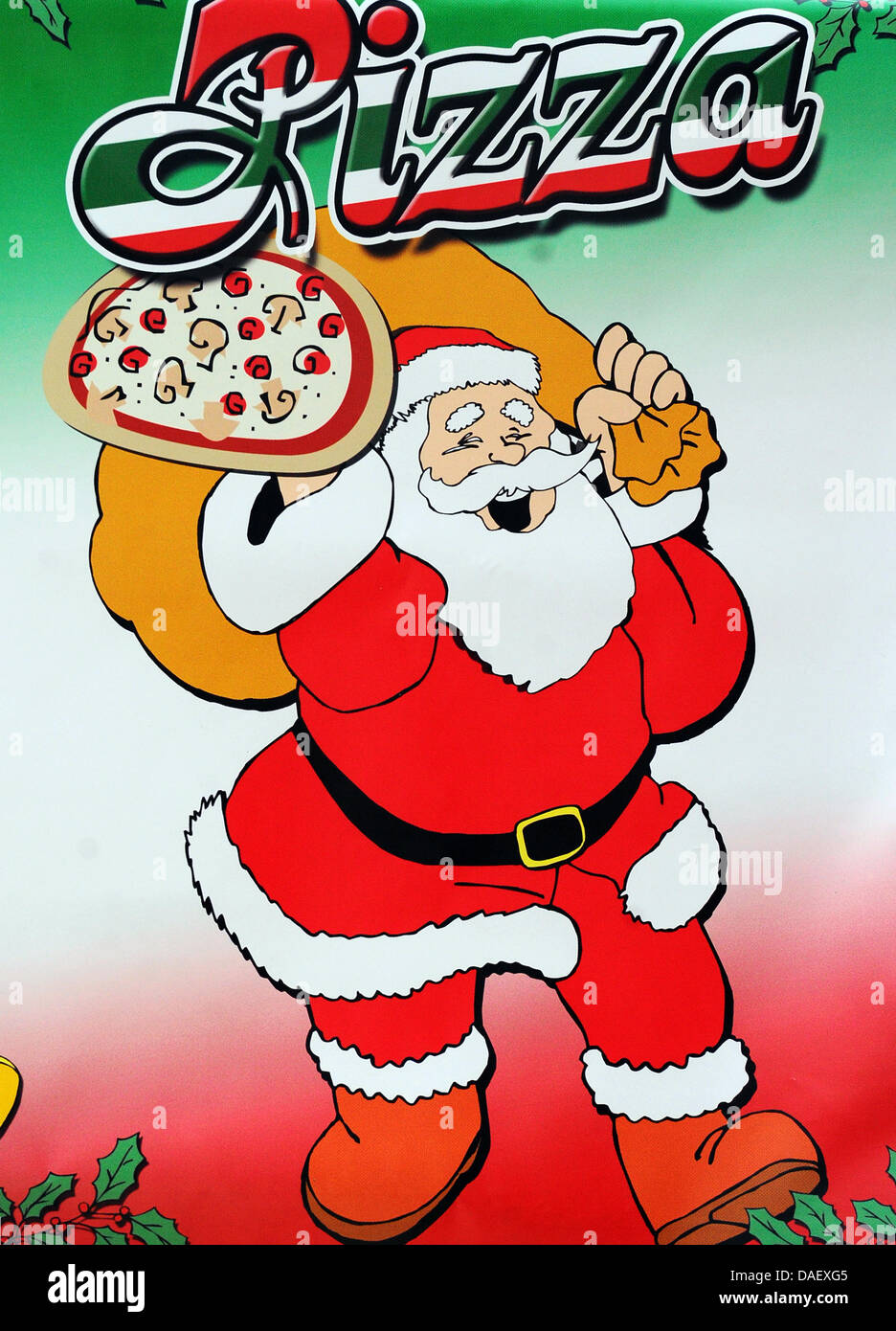 A sign advertises with Santa Claus as a pizza delivery man at the nostalgic Christmas Market at the Opernpalais in Berlin, Germany, 17 November 2011. Photo: JENS KALAENE Stock Photo