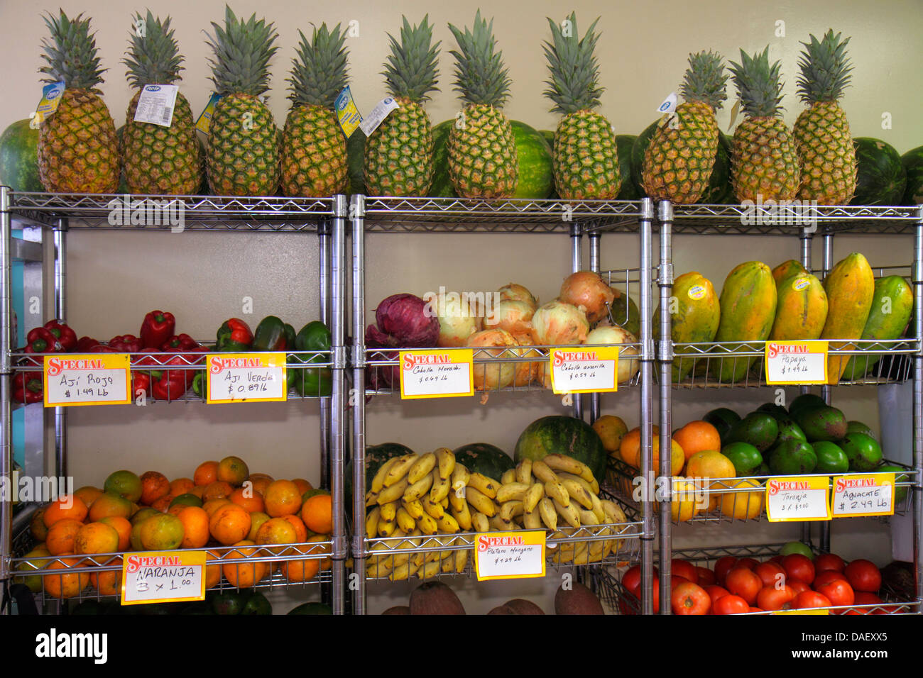 Miami Florida,El Palacio De Los Jugos,tropical fruit,sale,pineapples,peppers,papayas,onions,oranges,bananas,display sale FL130601050 Stock Photo