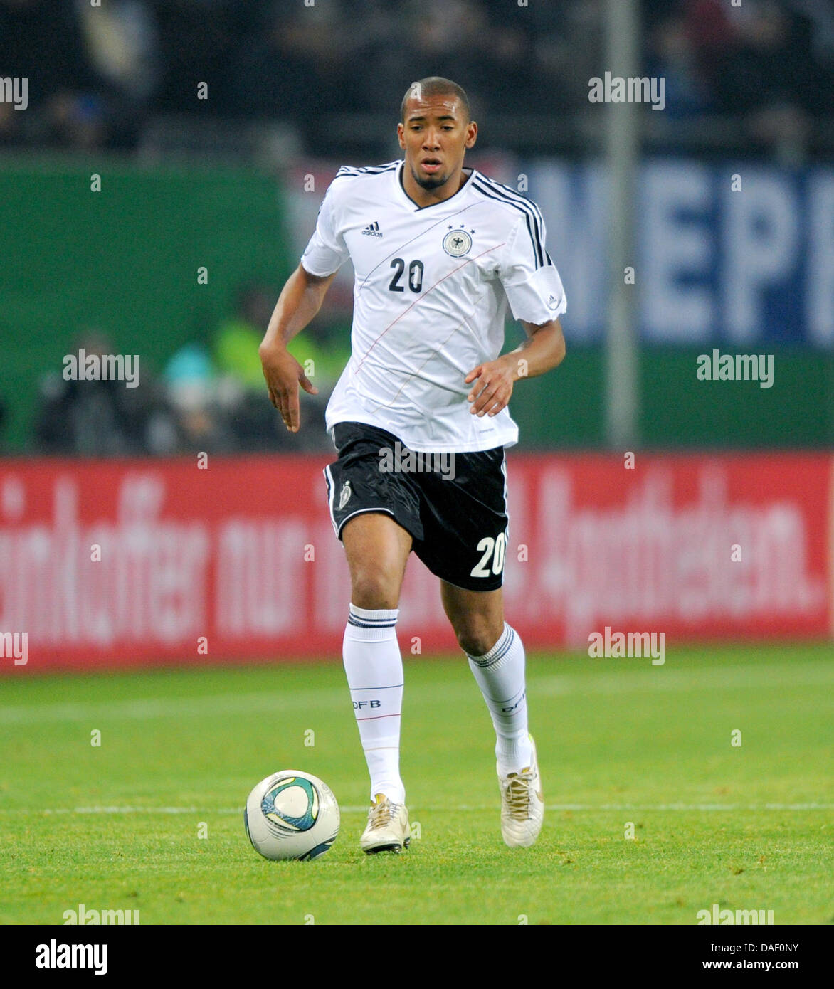 Germany's Jerome Boateng dribbles the ball during the national soccer friendly match Germany vs Netherlands at Imtech Arena in Hamburg, Germany, 15 November 2011. Photo: Thomas Eisenhuth Stock Photo