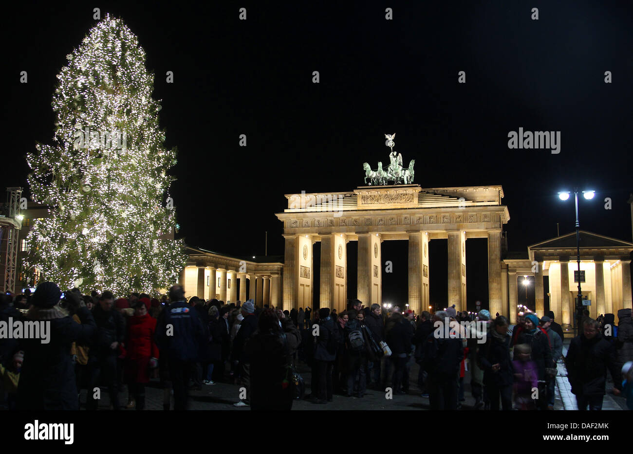 This year's Christmas tree is illuminated at the Brandenburg Gate in