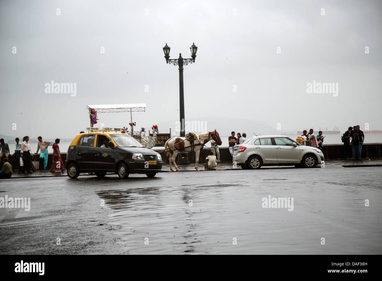 Street scene opposite Taj Mahal hotel with horse and cart Stock Photo