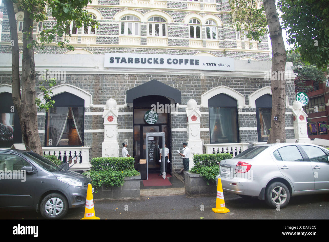 Starbucks Coffee house security entrance at rear of Taj Mahal Palace hotel in mumbai Stock Photo