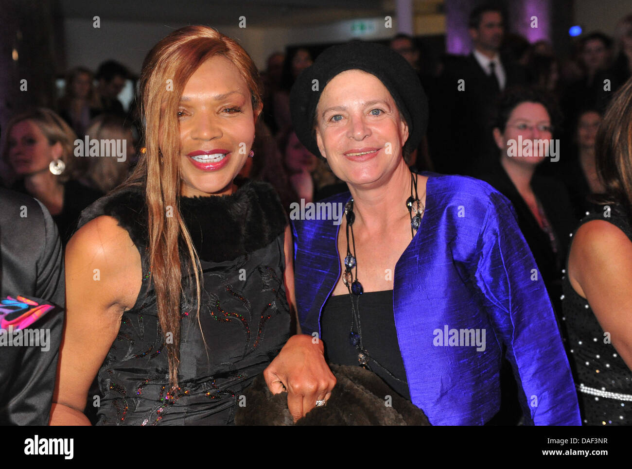 Valerie Campbell (L), mother of top model Naomi Campbell, and fashion designer Barbara Herzsprung attend a fashion show of Kay Rainer at the alte Boerse (building of former stock exchange) in Munich, Germany, 29 November 2011. The two professional models Padberg and Kurkova search for up-and-coming talents at the Kay Rainer fashion show for their new tv-show 'The perfect Model' pre Stock Photo