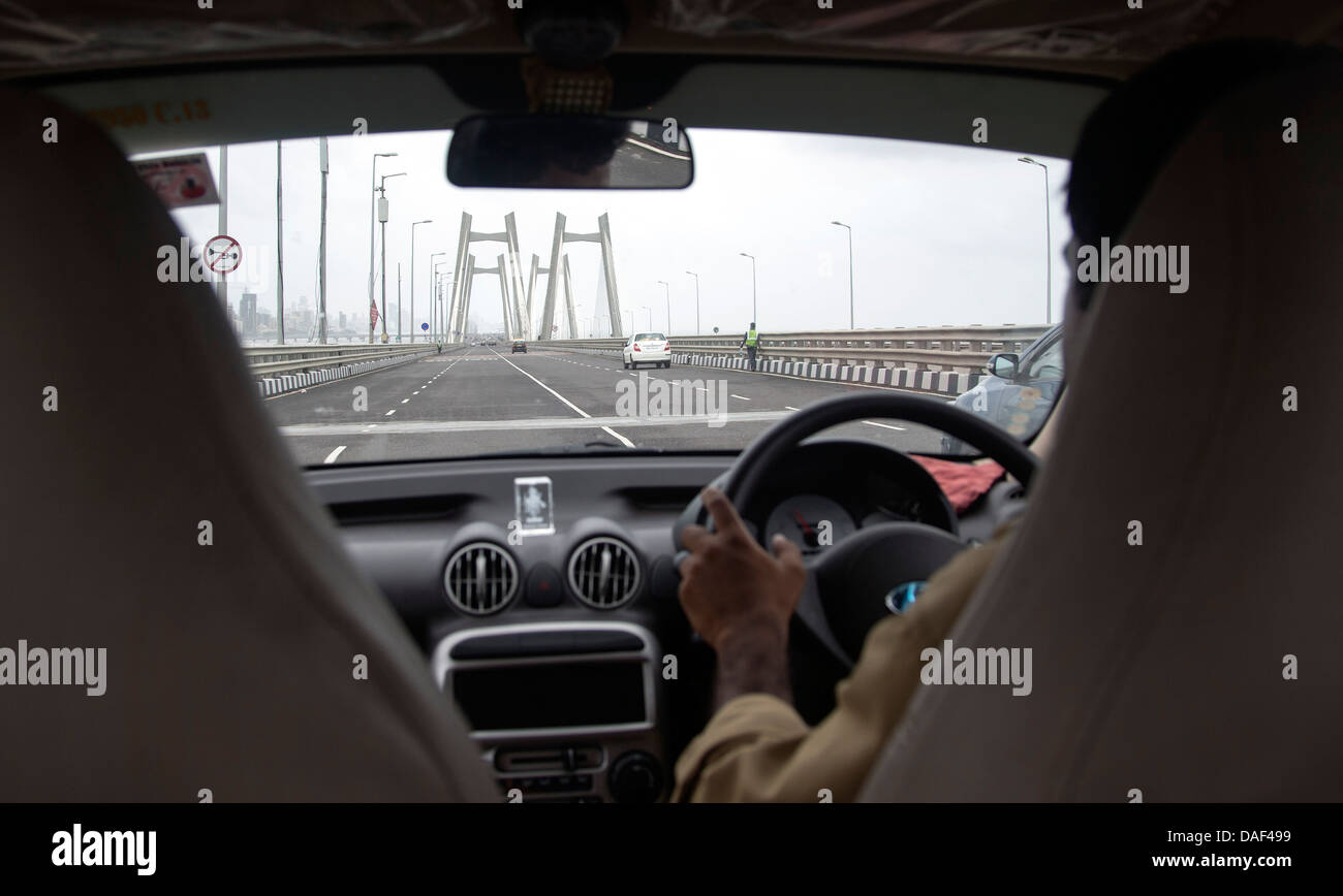 Taxi crossing Bandra–Worli Sea Link, officially called Rajiv Gandhi Sea Link, Mumbai, India Stock Photo