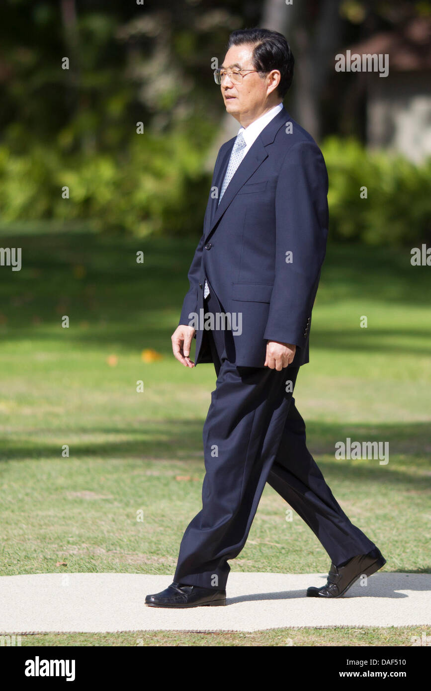 President Hu Jintao of China walks to participate in the "family photo" of world leaders during the Asia-Pacific Economic Cooperation (APEC) Summit at the J.W. Marriott Hotel in Honolulu, Hawaii on Sunday, November 13, 2011..Credit: Kent Nishimura / Pool via CNP Stock Photo